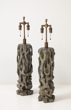 Exceptional Pair of Carved Gnarly Tree Form Lamps by James Mont.