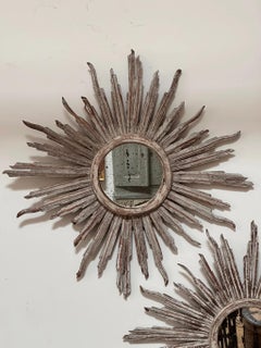 Exceptional Pair of carved painted Italian Starburst Mirrors