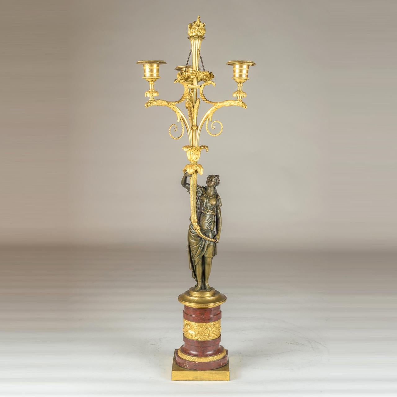 Raised on ormolu and rouge marble.?

Origin: French
Date: Circa 1780
Dimension: Height: 27 in. x 8 in.