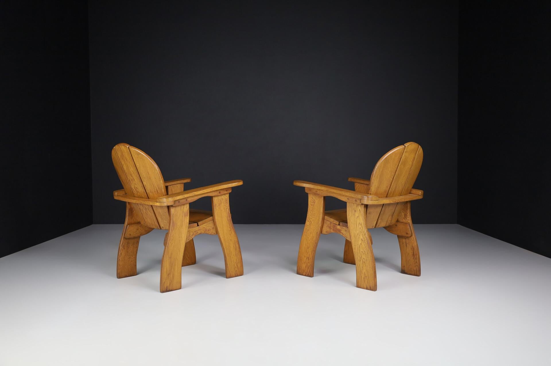 Exceptional Pair of French Brutalist Lounge Chairs in Sculpted Solid Oak, 1960s For Sale 6