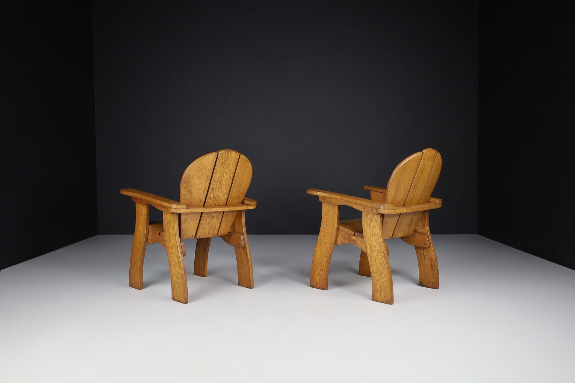 Exceptional Pair of French Brutalist Lounge Chairs in Sculpted Solid Oak, 1960s For Sale 5