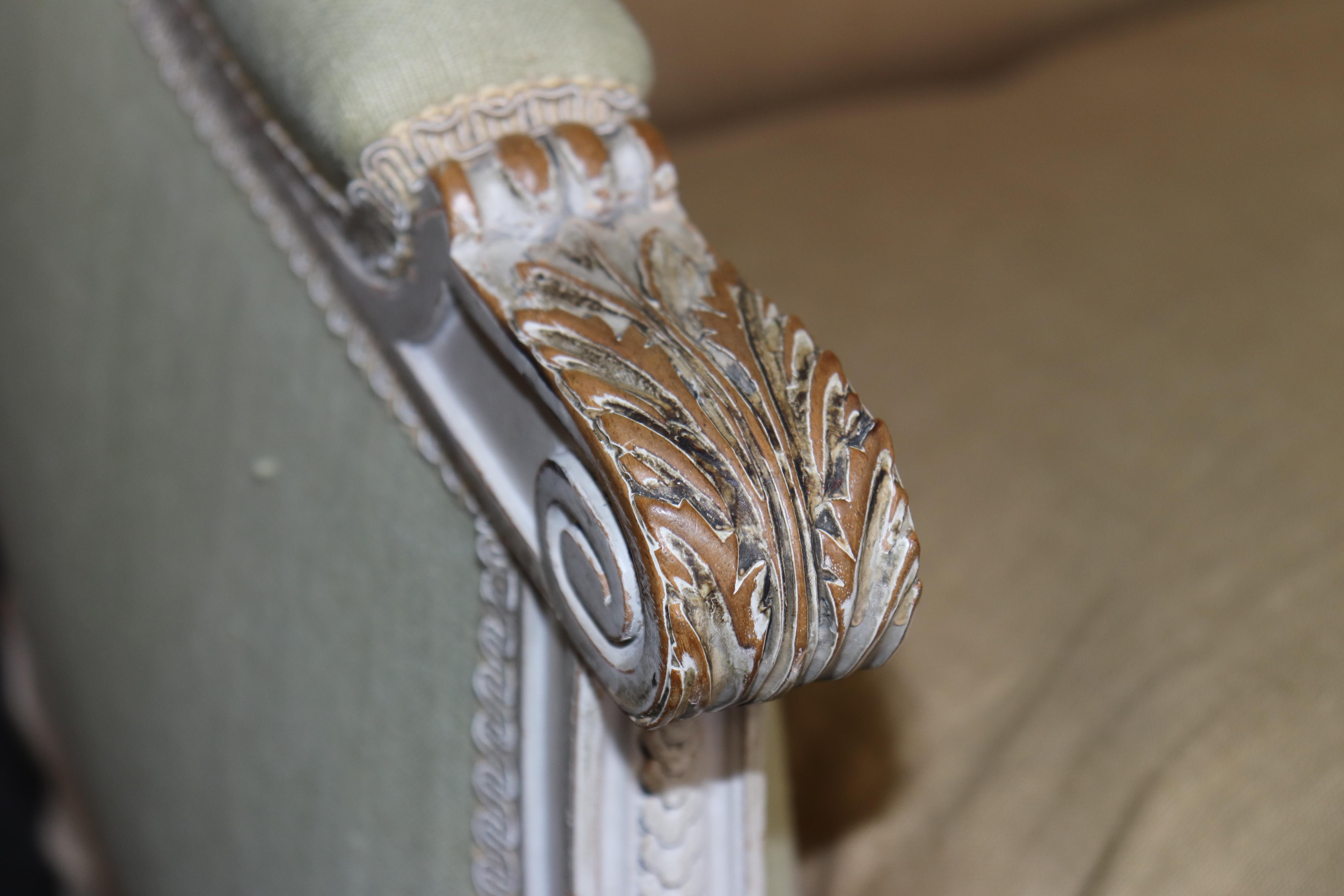 Exceptional pair of French Louis XVI Style Creme Painted Bergere Chairs For Sale 5