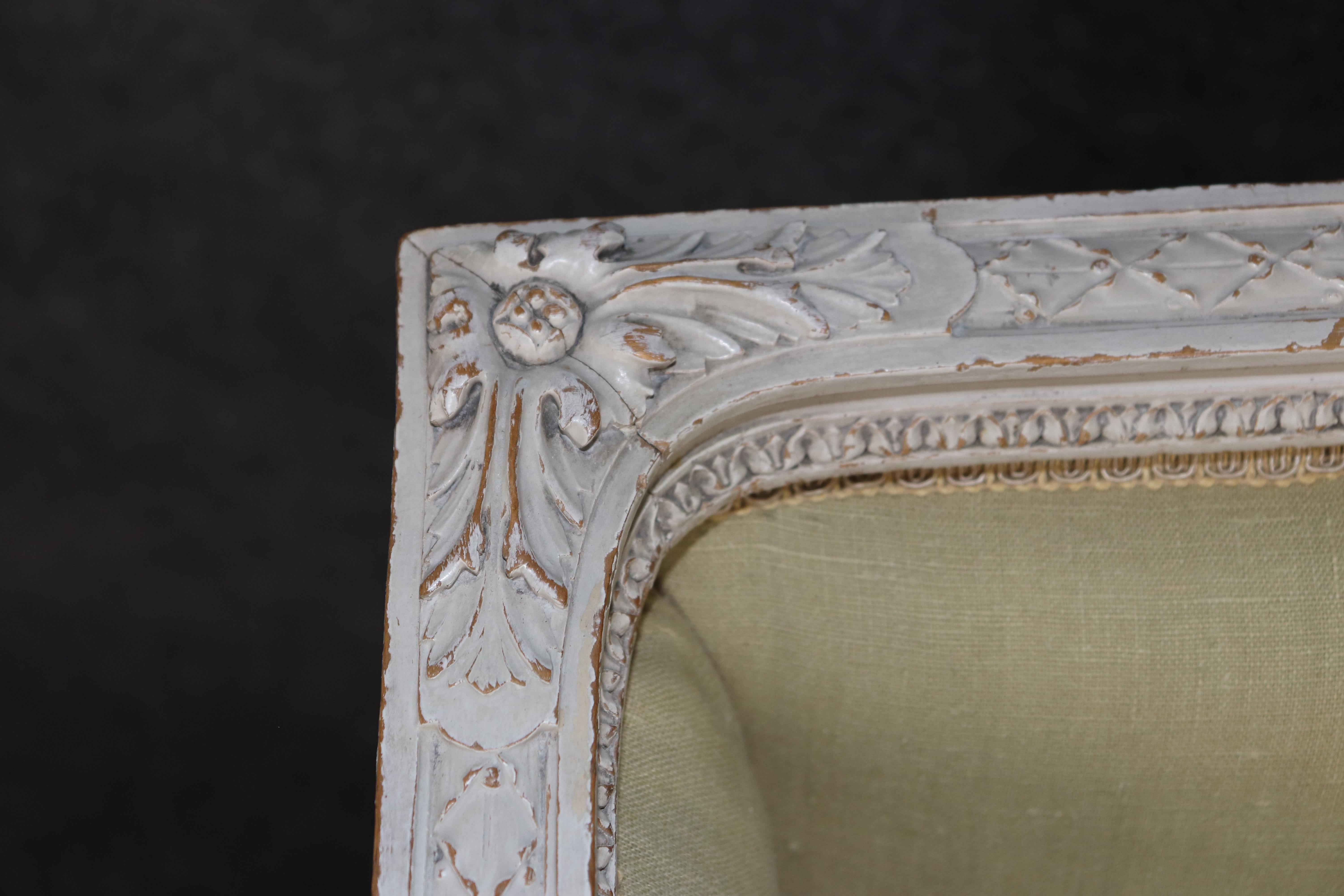 Exceptional pair of French Louis XVI Style Creme Painted Bergere Chairs For Sale 8