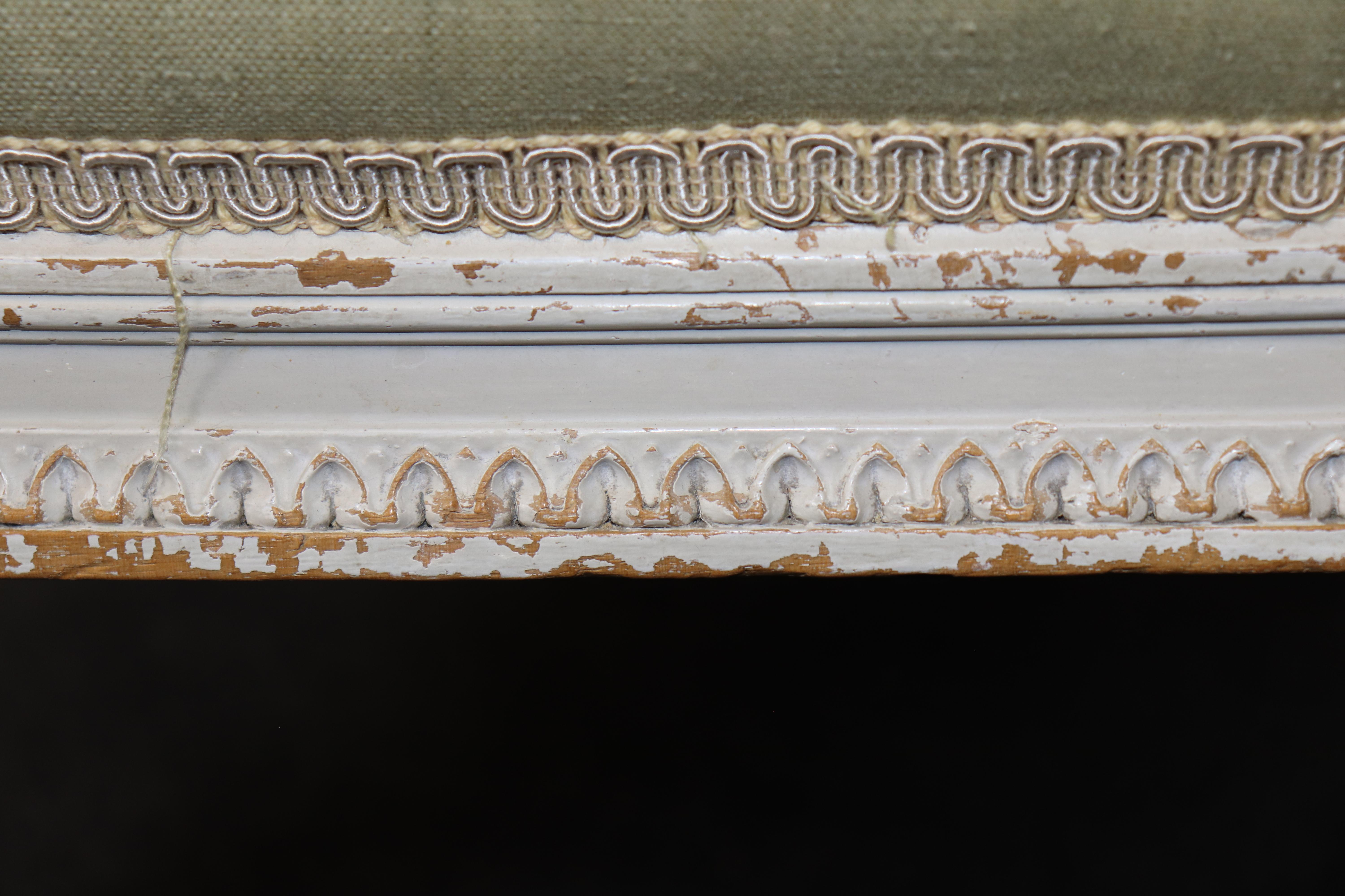 Exceptional pair of French Louis XVI Style Creme Painted Bergere Chairs For Sale 9