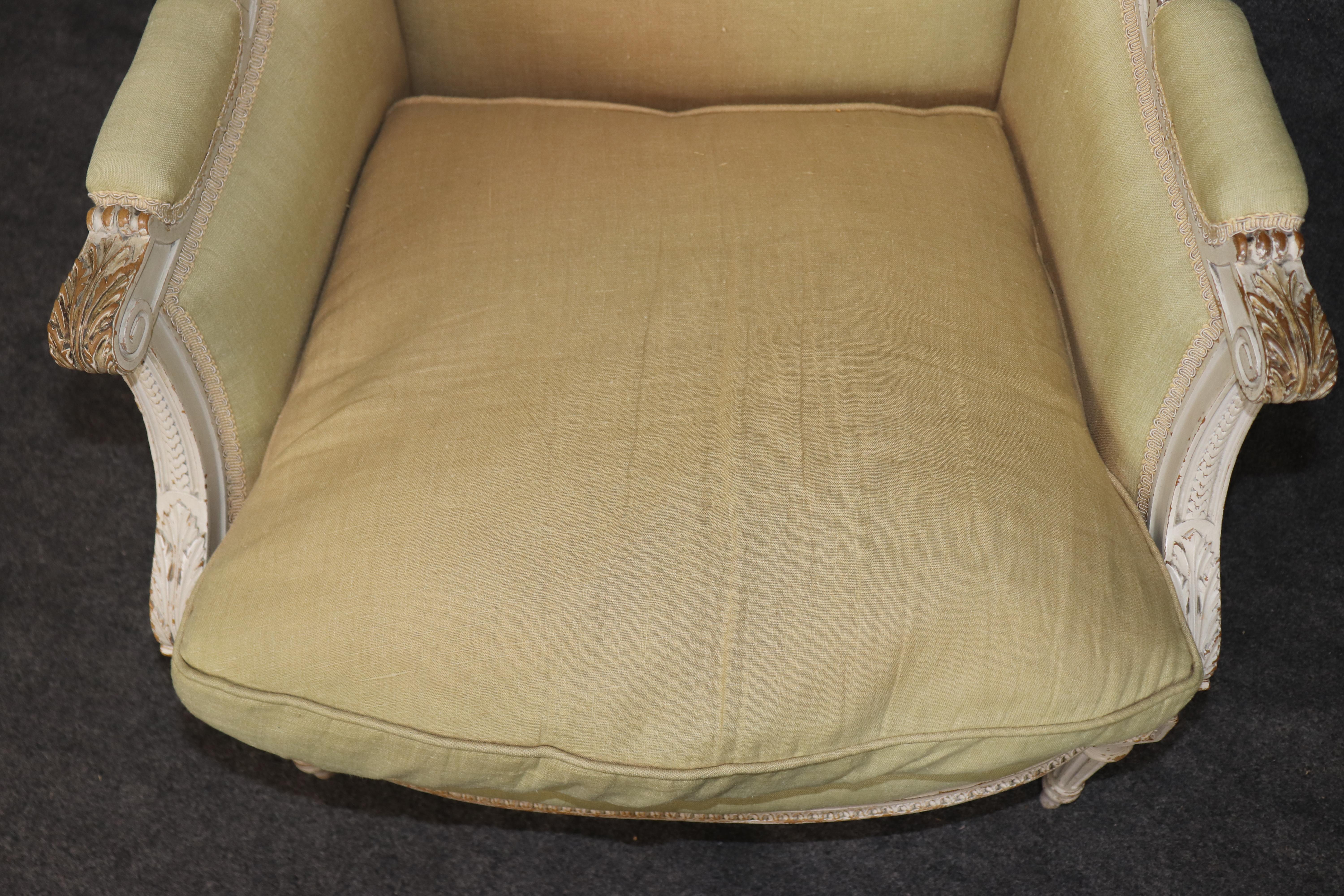 Exceptional pair of French Louis XVI Style Creme Painted Bergere Chairs For Sale 10