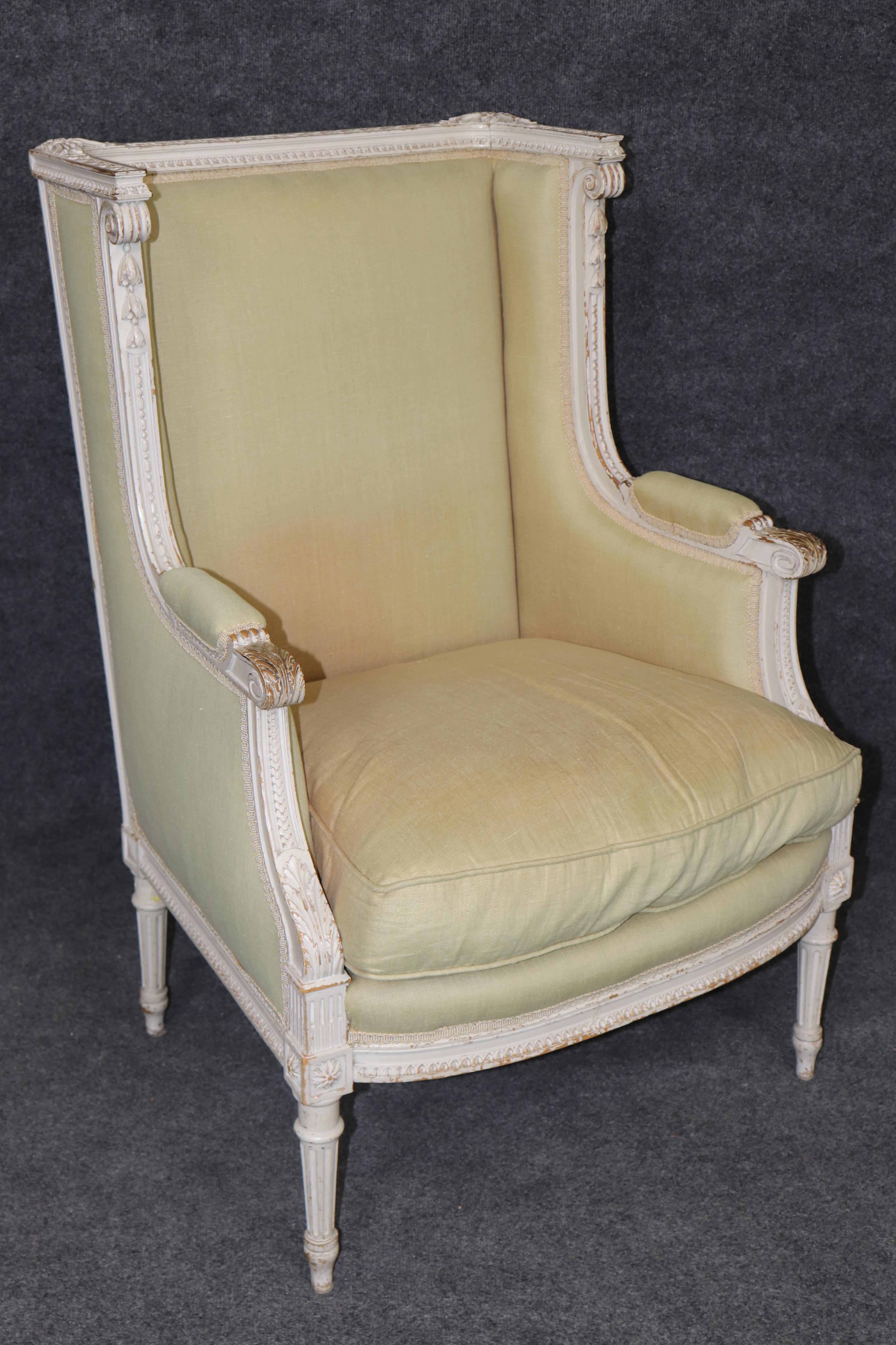 Exceptional pair of French Louis XVI Style Creme Painted Bergere Chairs For Sale 1