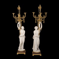 Eccezionale coppia di candelabri francesi in marmo con montatura in ormù di Sormani di Parigi