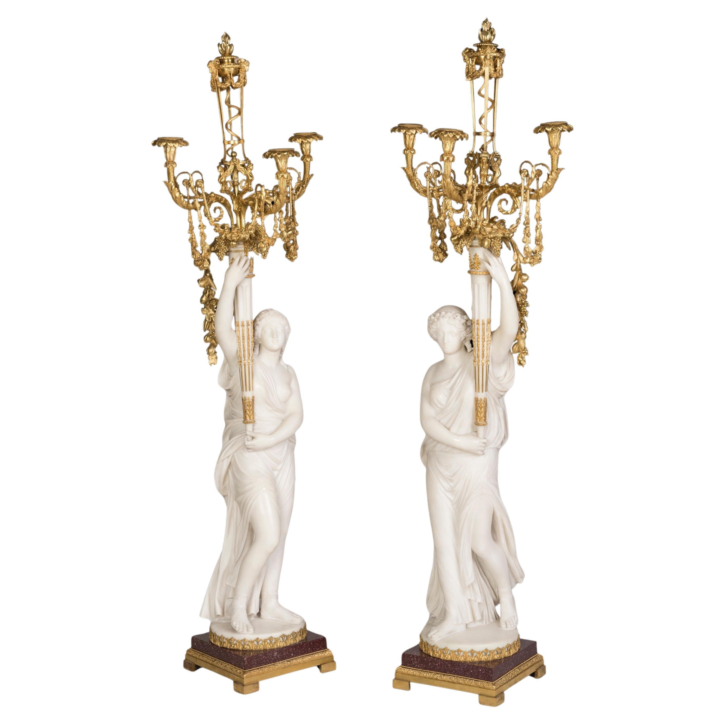 Exceptionnelle paire de candélabres français en marbre montés en bronze doré par Sormani de Paris en vente