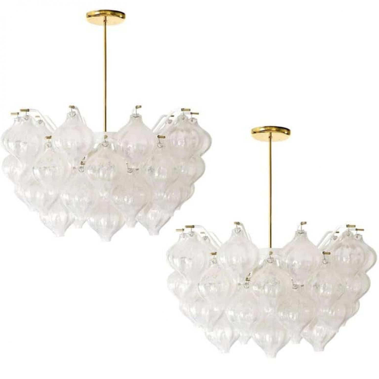 An exceptional 'Tulipan' pair by J.T. Kalmar, Austria, Vienna, manufactured in 20th century, circa 1970, (late 1960s-early 1970s). With beautiful Murano Tulipan shaped blown bubble glasses. Several glasses are mounted on a white enameled metal