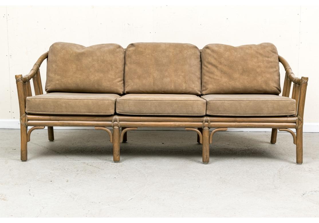Mid-Century Modern Exceptional Pair Of McGuire Rattan Framed Sofas For Sale