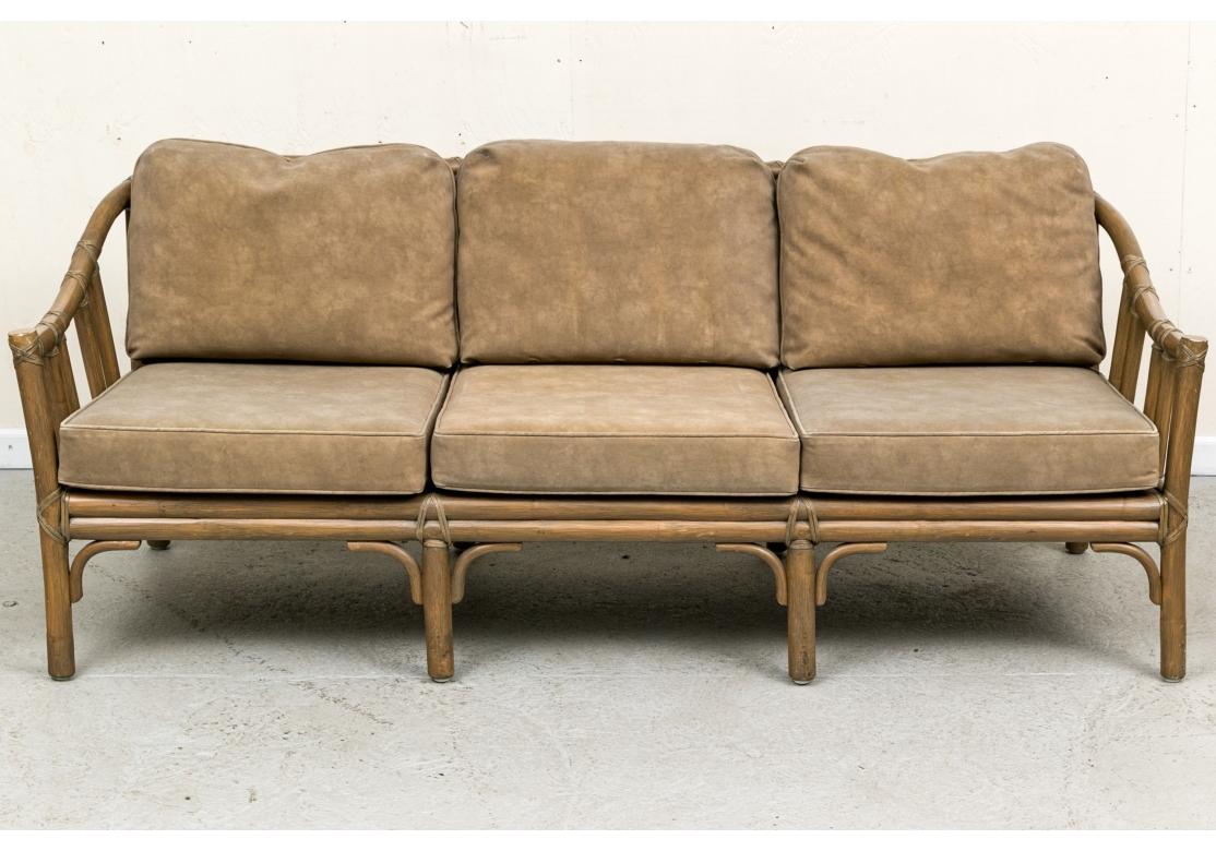 20th Century Exceptional Pair Of McGuire Rattan Framed Sofas For Sale