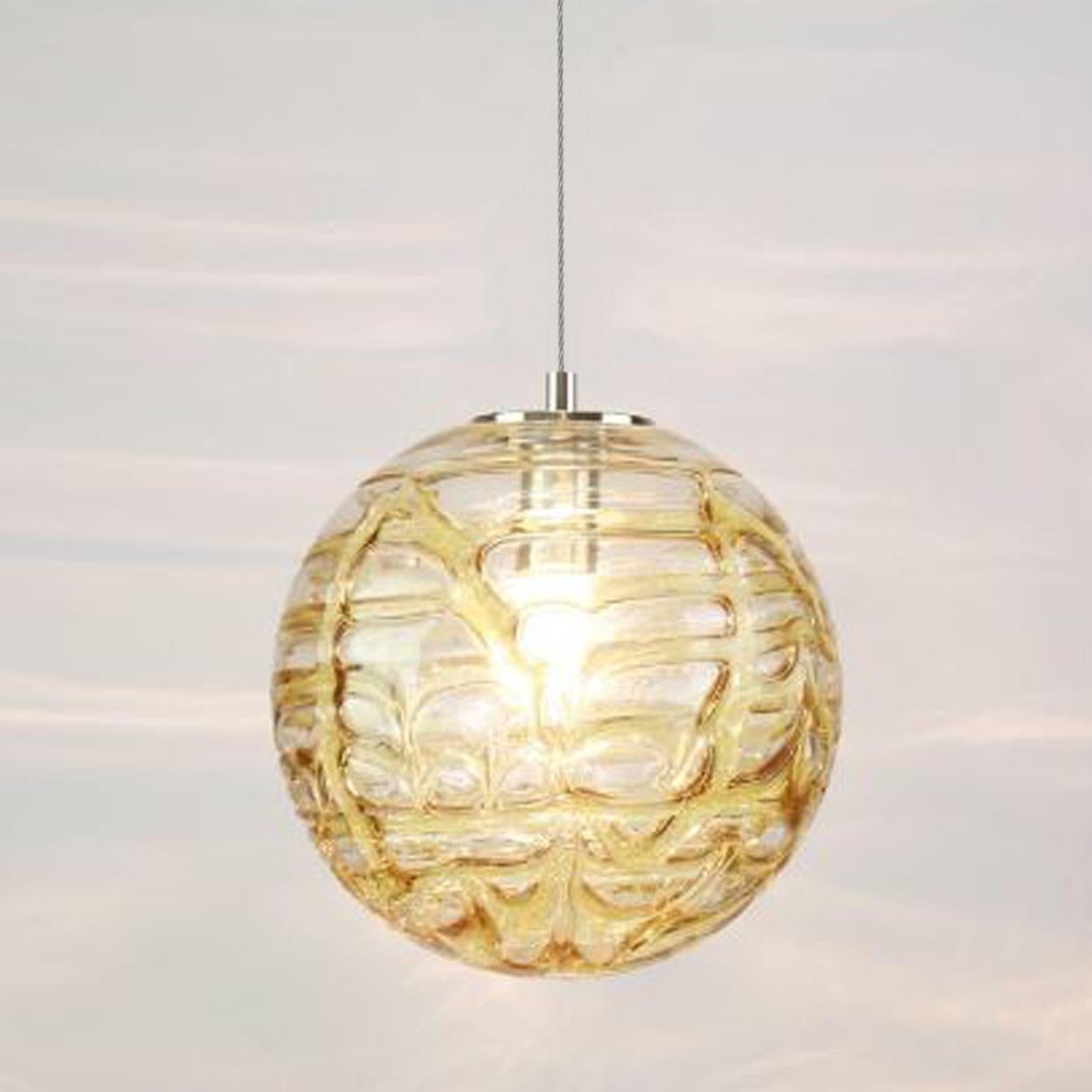 Pair of high-end Murano pendant lights in the style of Venini, manufactured circa 1960. Real statement pieces. Heavy quality thick Murano crystal glass shade made out of overlay glasses of clear, light amber and dark amber applied in irregular