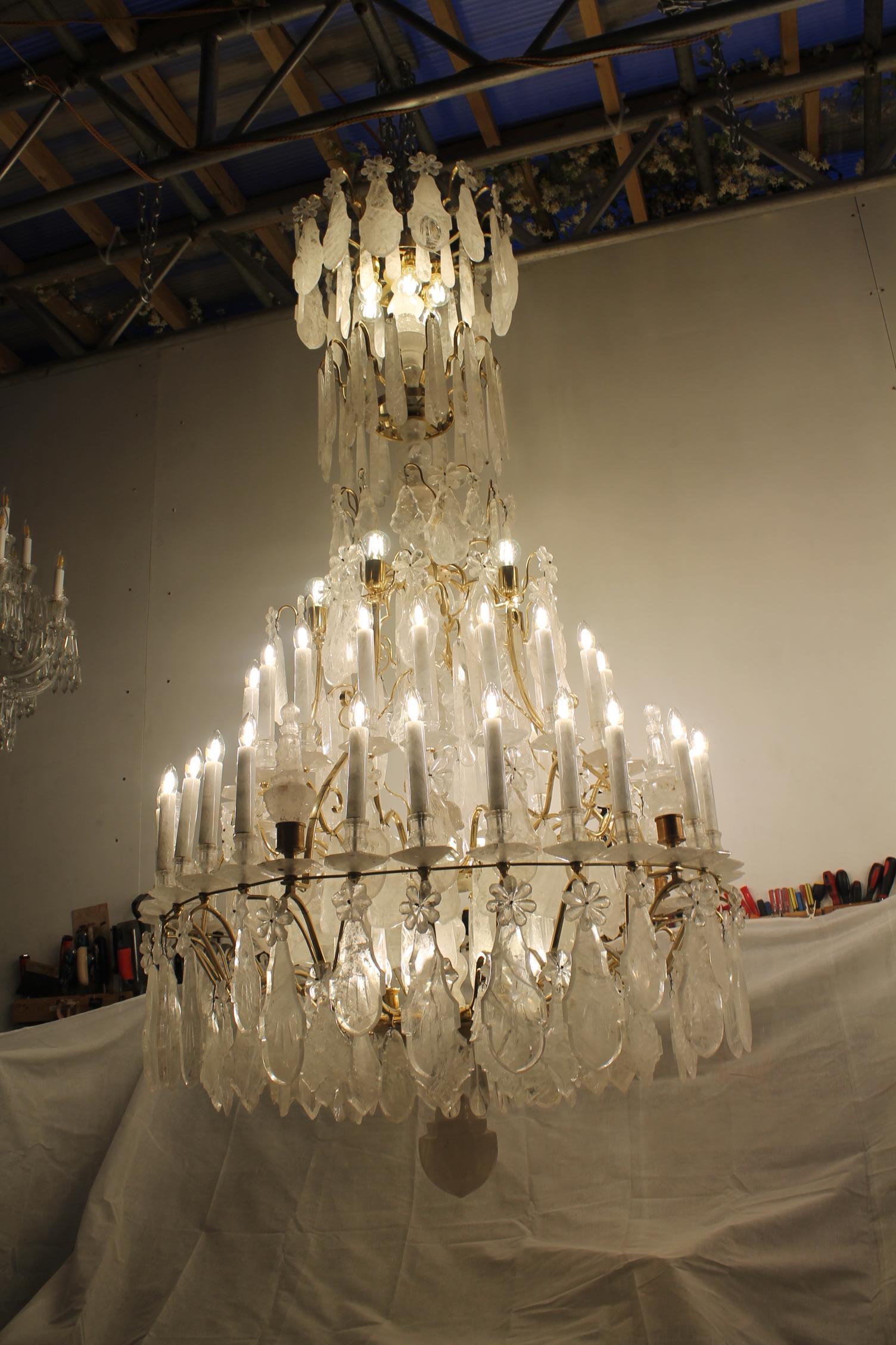 Contemporary Exceptional pair of rock crystal chandeliers in the classic Louis XV style For Sale