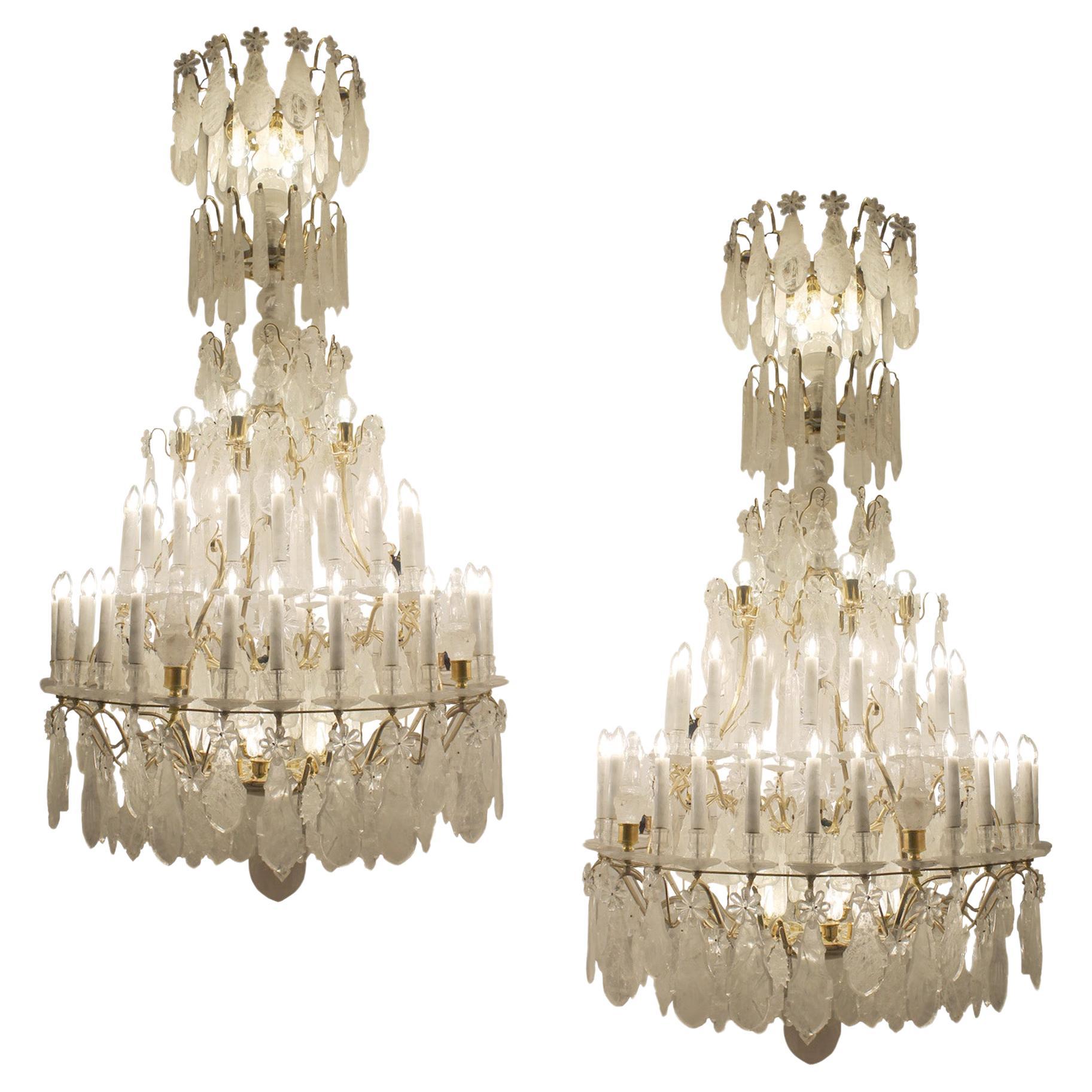 Exceptional pair of rock crystal chandeliers in the classic Louis XV style For Sale