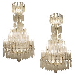 Exceptional pair of rock crystal chandeliers in the classic Louis XV style