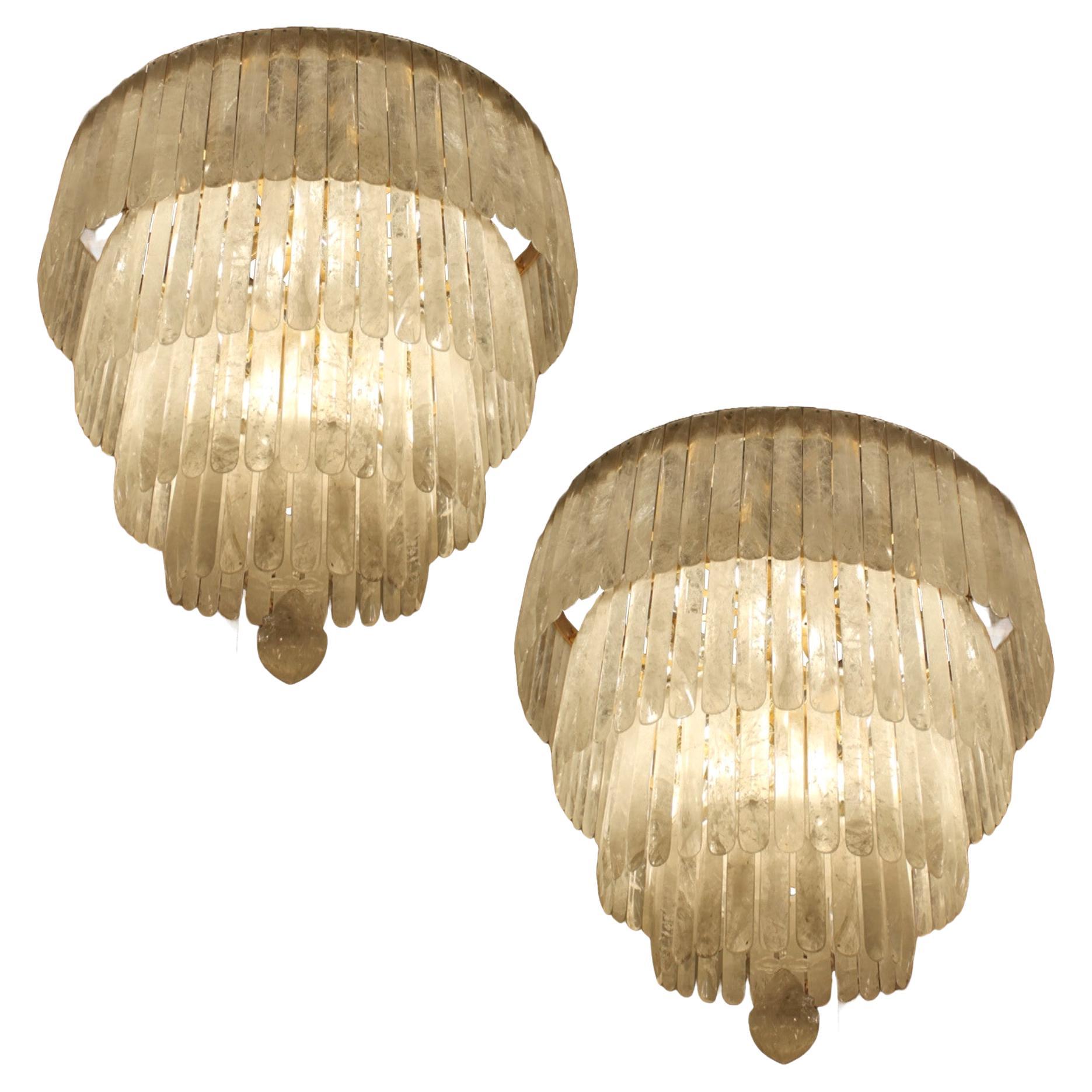 Unique Exceptional pair of rock crystal chandeliers with four tiers sixty light  For Sale