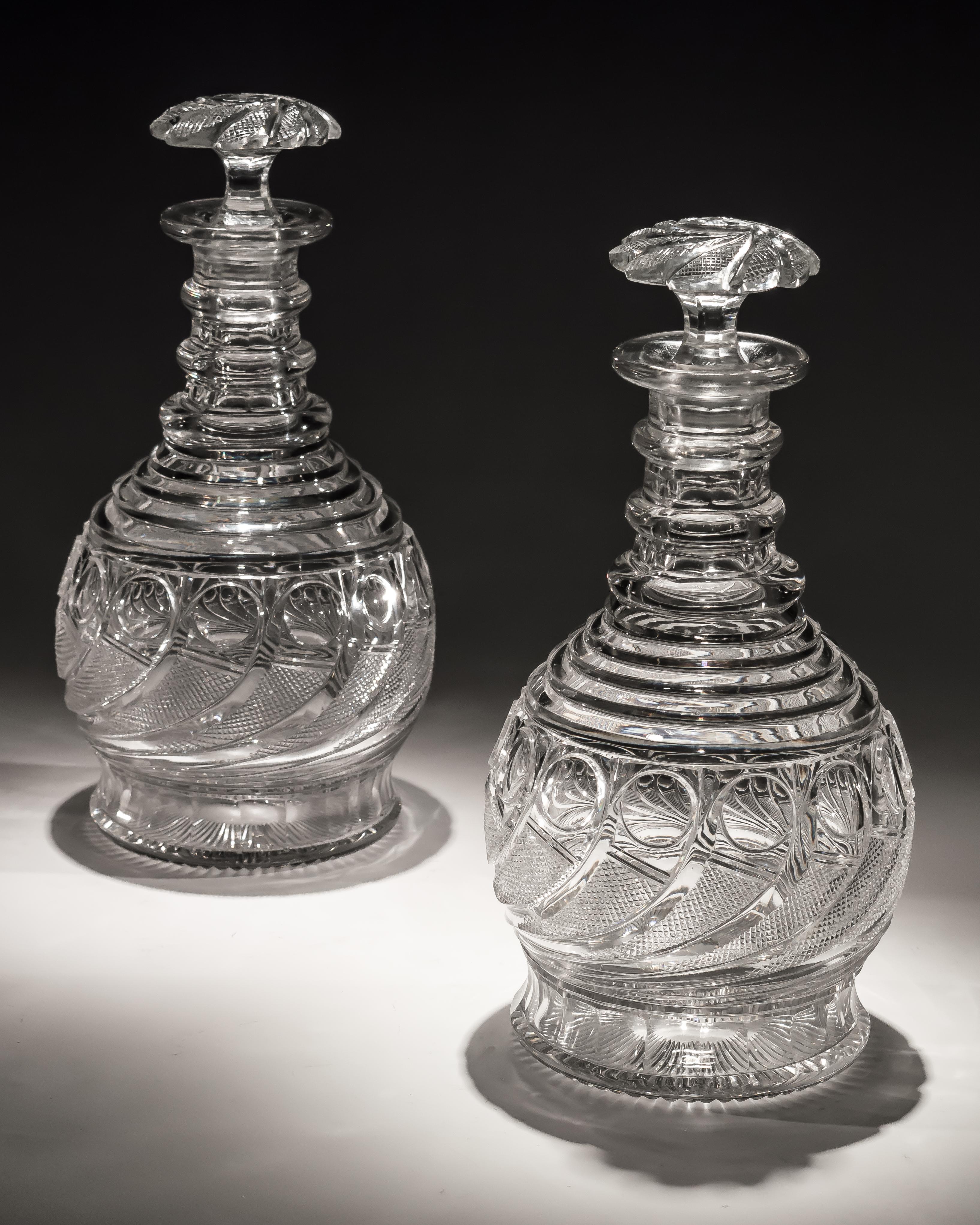 Exceptional Pair of Swirl Cut Regency Decanters with Swirl Cut Stoppers In Good Condition For Sale In Steyning, West sussex