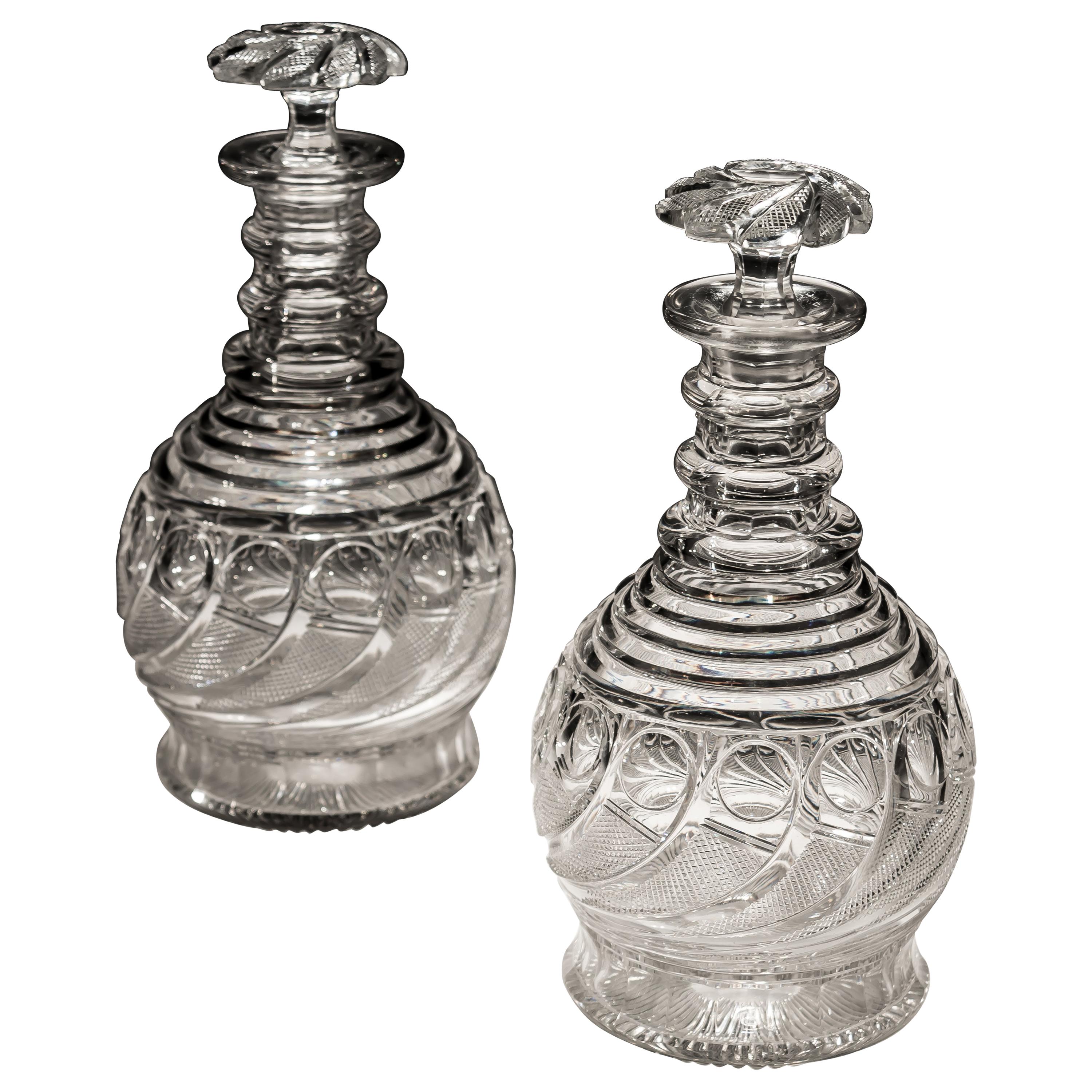 Exceptional Pair of Swirl Cut Regency Decanters with Swirl Cut Stoppers For Sale
