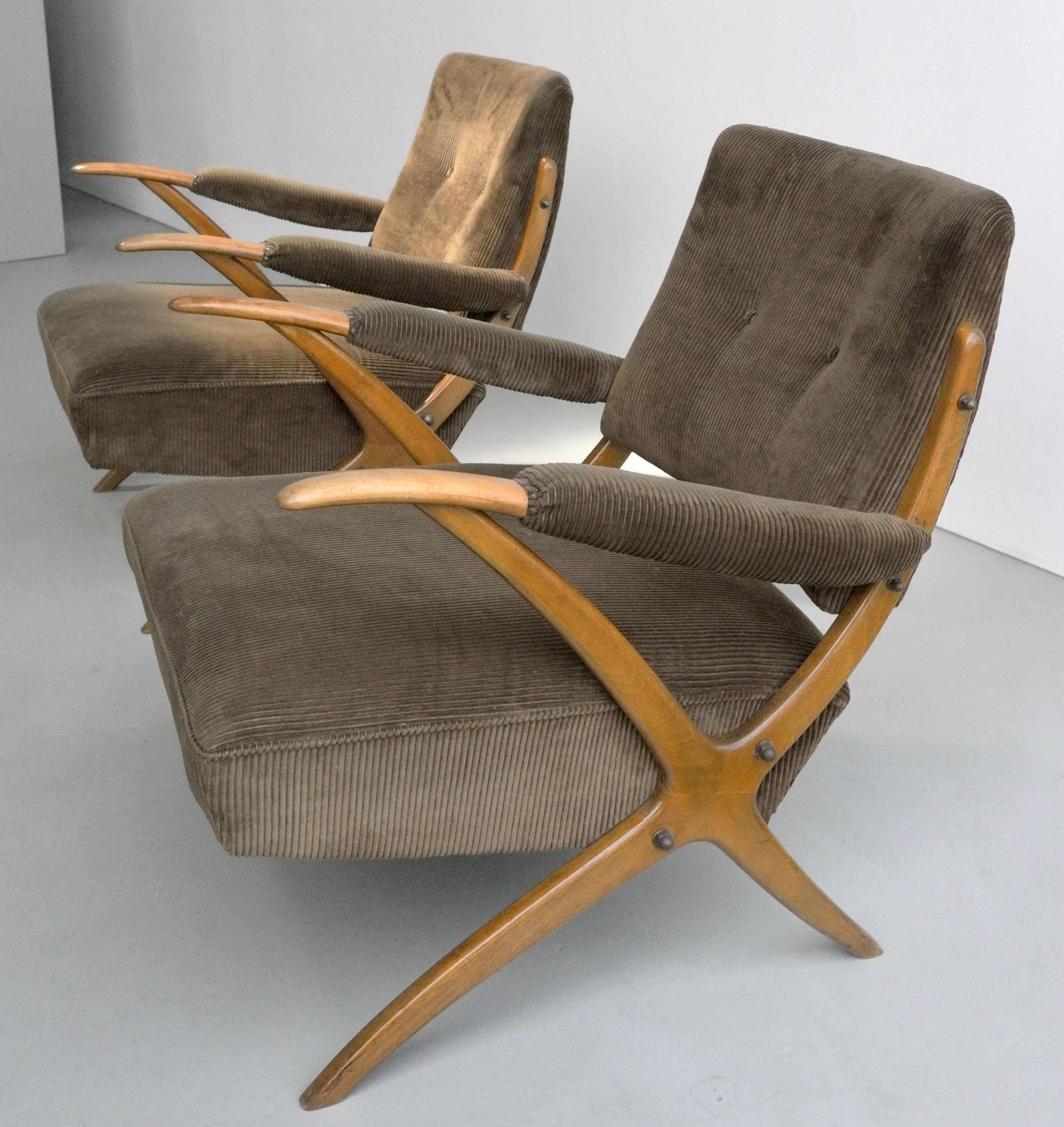Exceptional cross-frame wooden lounge chairs, Italy, 1950s.
For the touch we kept the original upholstery from this rare pair of lounge chairs.
Imagine these with a velvet-abundant upholstery, suitable in any midcentury or modern interior.