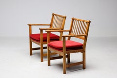 Exceptionnelle paire de fauteuils Yngve Ekström pour Swedese, 1950, nouveau bouclé rouge