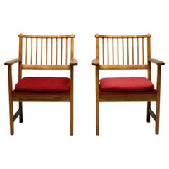 Exceptionnelle paire de fauteuils Yngve Ekström pour Swedese, 1950, nouveau bouclé rouge