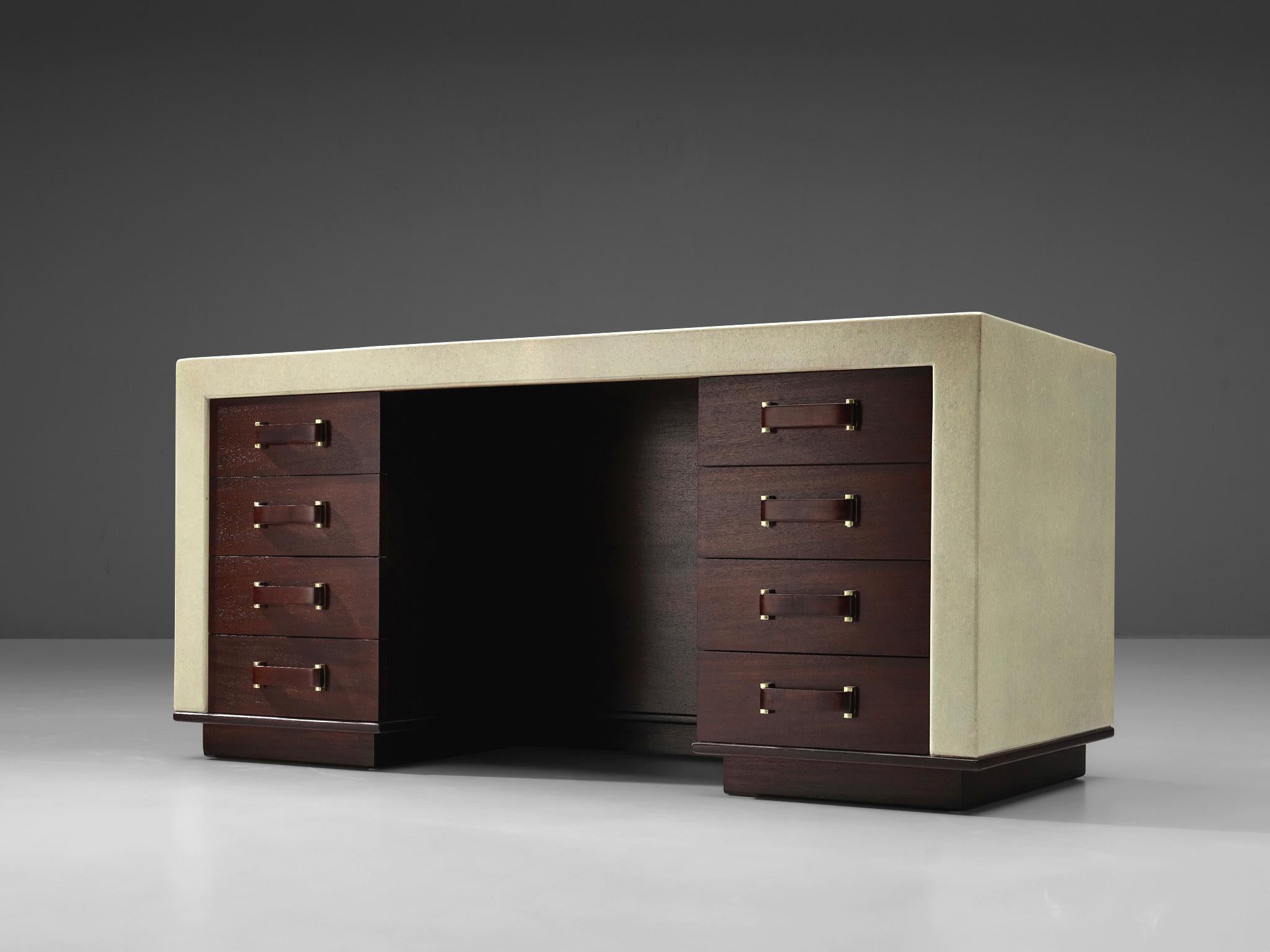 Paul Frankl for Johnson Furniture, free-standing desk, cork, mahogany, brass, United States, 1940s. 

This rare piece shows an exquisite construction based on a cubic shape executed in beautiful materials. The tabletop is made of cork which