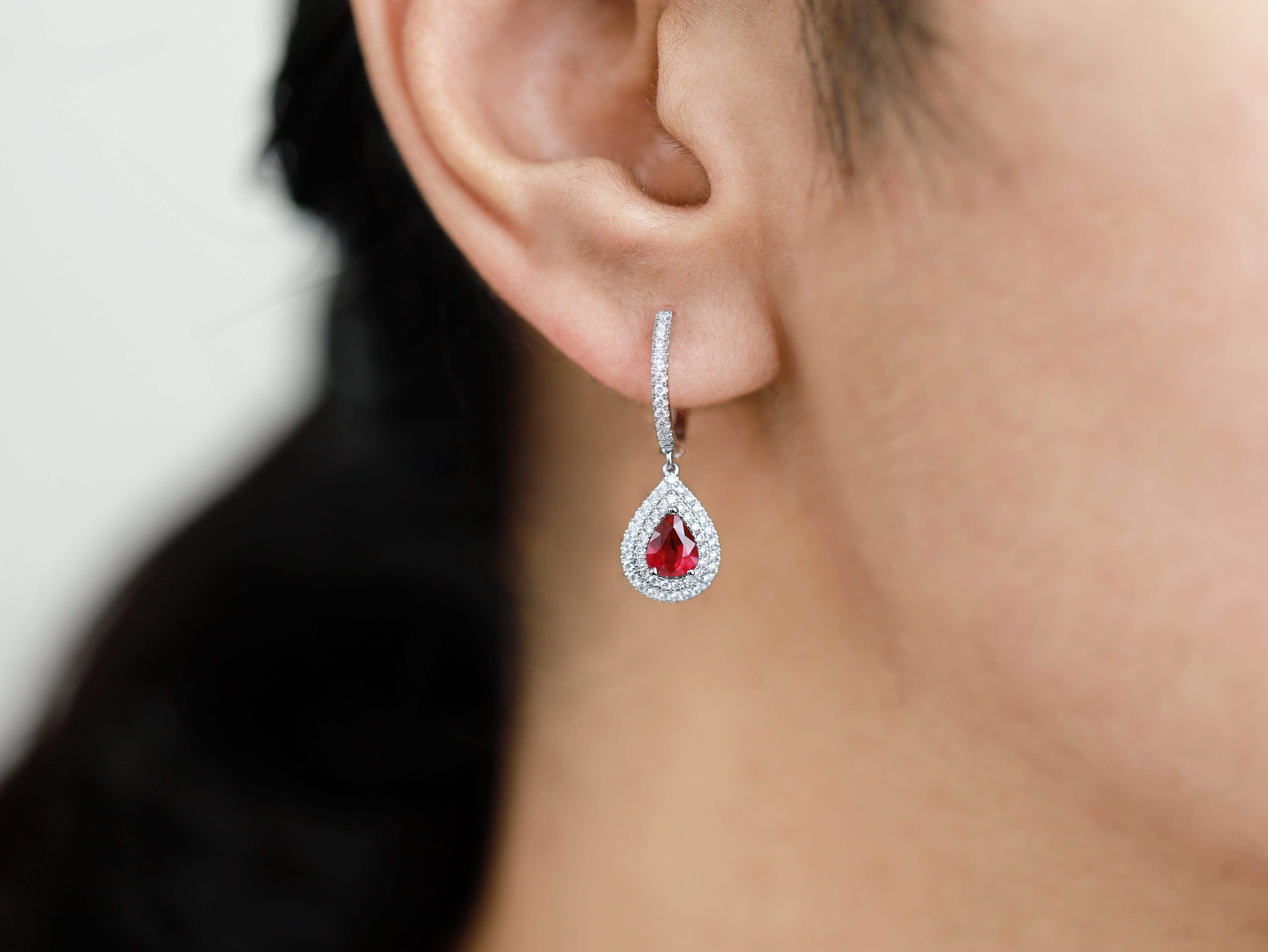 Pear Cut Exceptional Pear natural ruby diamond dangle earrings, halo diamond in 18k gold For Sale