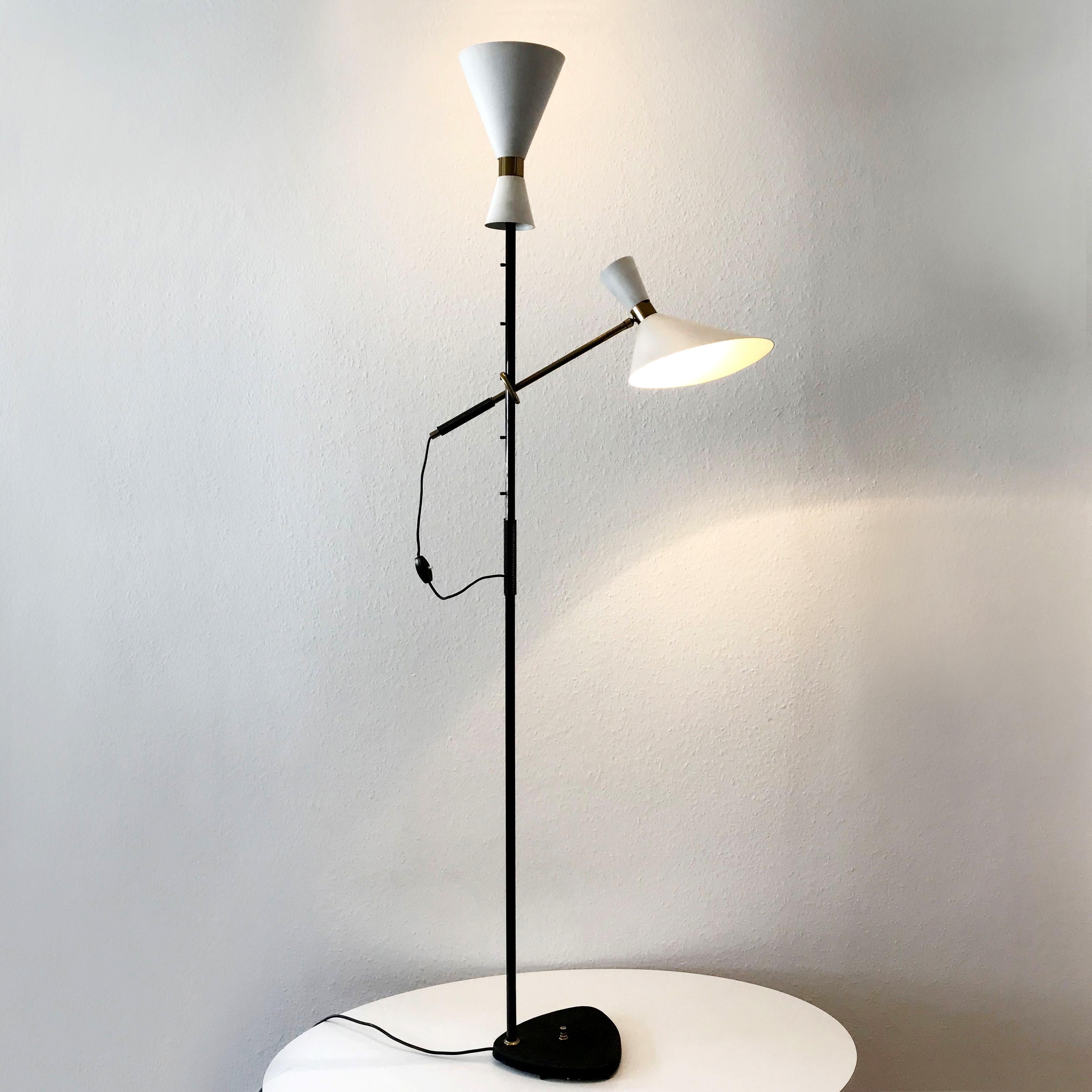 Extremely rare and elegant Mid-Century Modern floor lamp. Model Pelikan, two flamed and one arm and shade adjustable. Designed by Julius Theodor and manufactured by J.T. Kalmar, Vienna, Austria, 1950s.

Executed in brass, aluminium, steel and cast