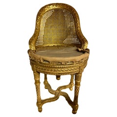 Exceptional piano giltwood armchairs