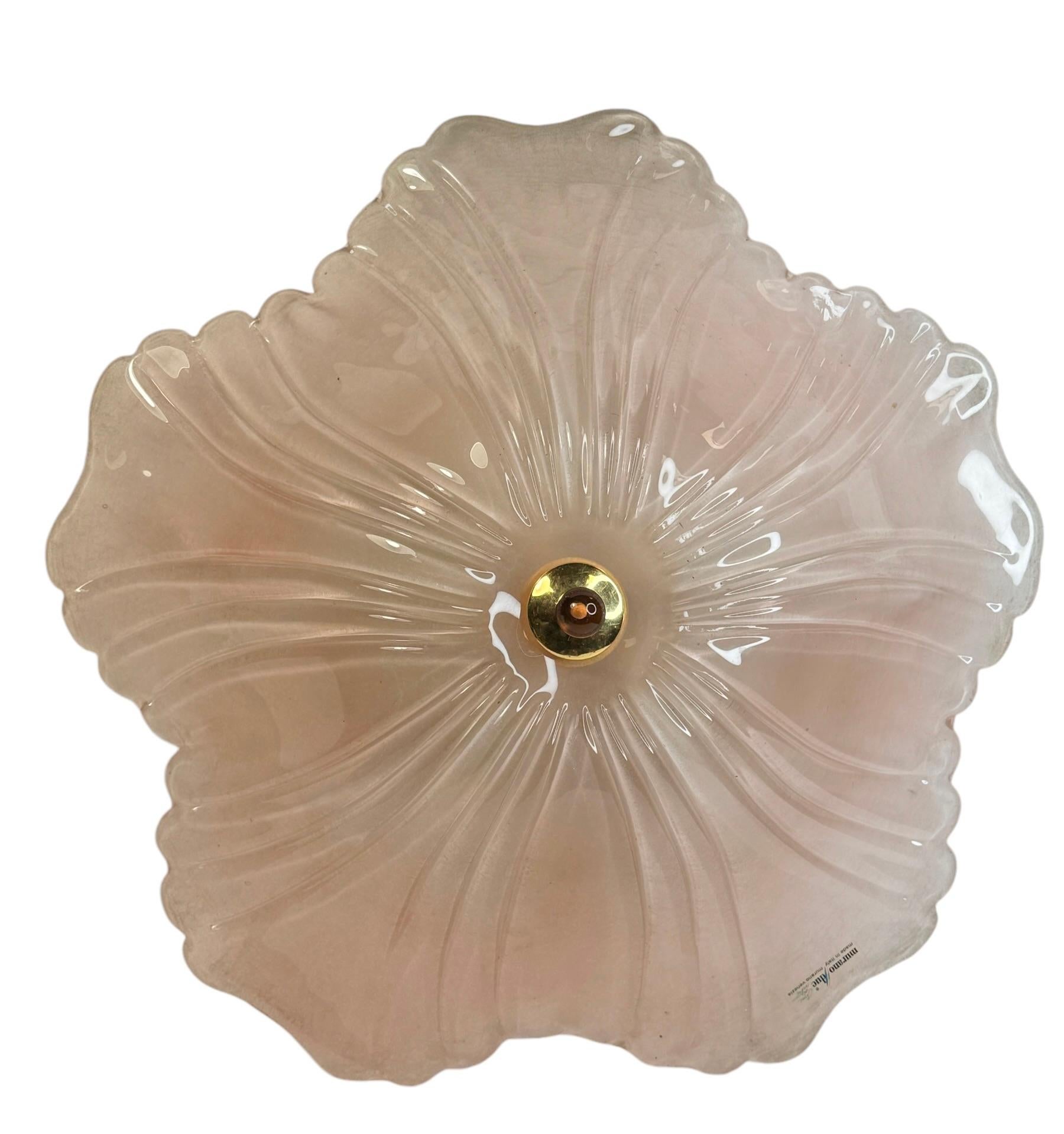 A beautiful glass flush mount. Made in Murano Venice Italy, made by Murano Due. Gorgeous textured glass flush mount with metal fixture. The Fixture requires five European E14 / 110 Volt Candelabra bulbs, each bulb up to 40 watts. A nice addition to