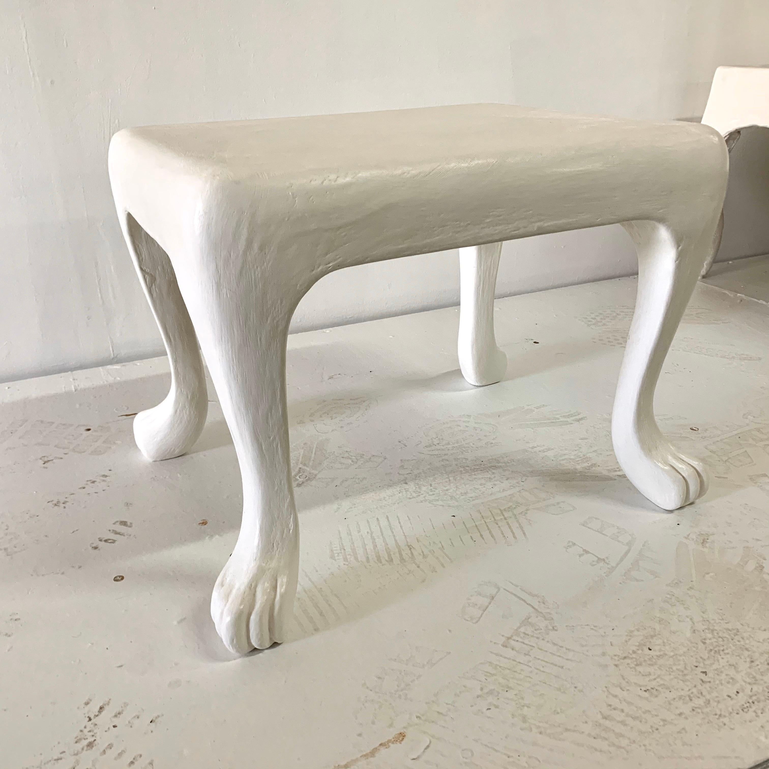 The plaster finish is absolutely lovely and textured on this lions feet base table.