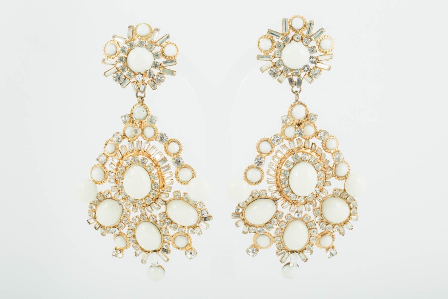These exquisite poured glass earrings are true statement earrings, truly glamorous and quite, quite unique. Handmade in way made famous by and instantly recognisable as Maison Gripoix, ivory coloured poured glass  and clear pastes are set in a