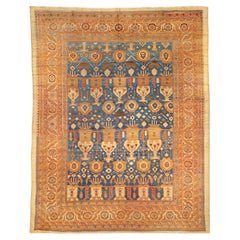 Alriz Collection: Exceptional Primitive Camel Hair Bakshaish Rug 1870
