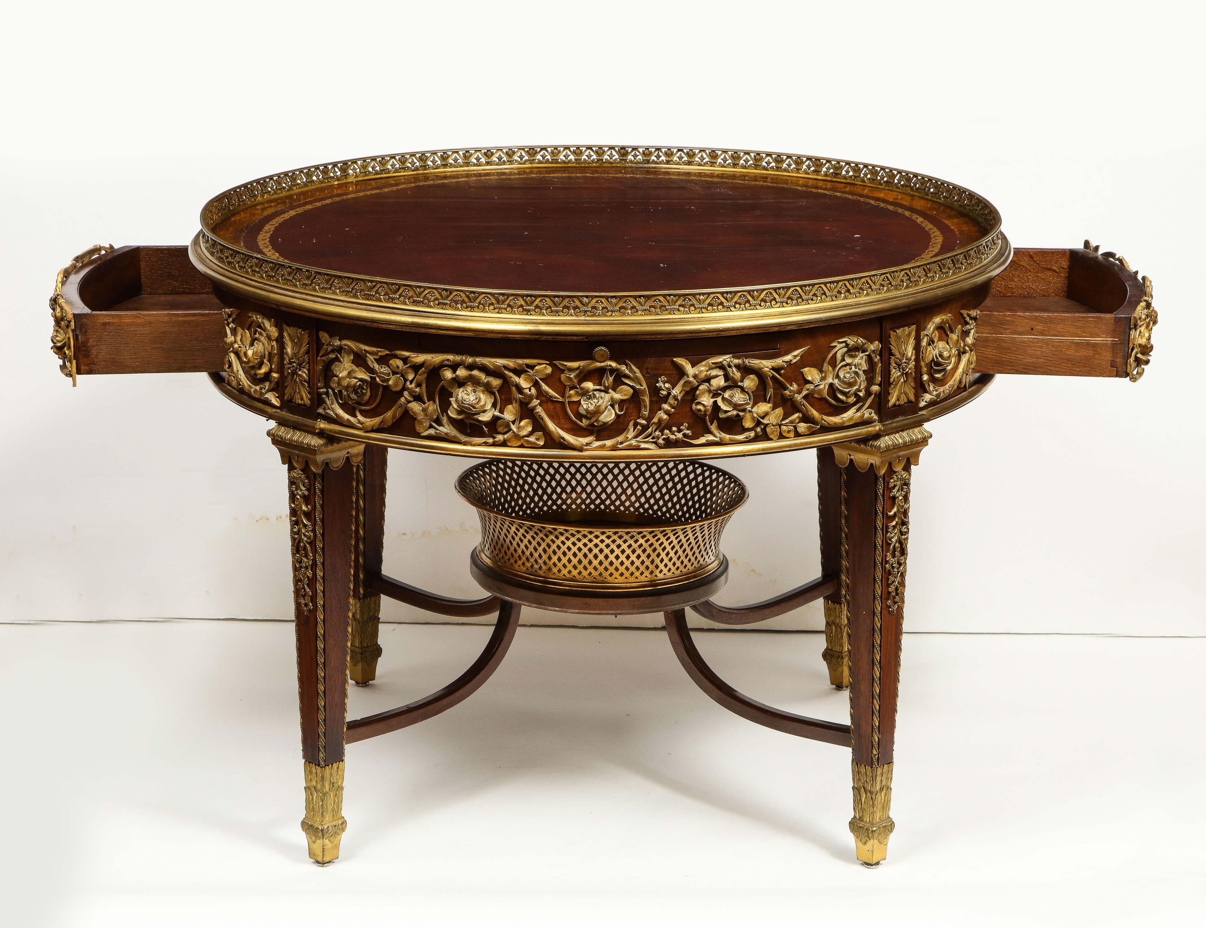 An exceptional quality Louis XVI style French ormolu-mounted mahogany and leather coffee center table, attributed to Francois Linke, Paris, circa 1880.

This is the best ormolu-mounted table we have had over the past 10 years. The bronze mounts