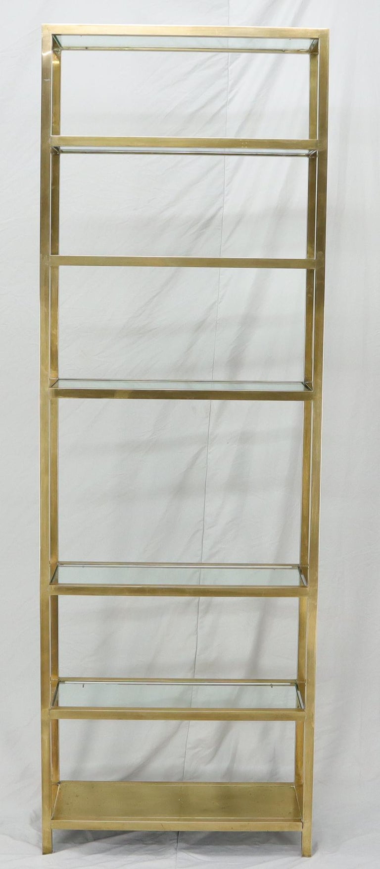 Slim narrow and tall brass etagere all beautifully braised with heavy 3/4