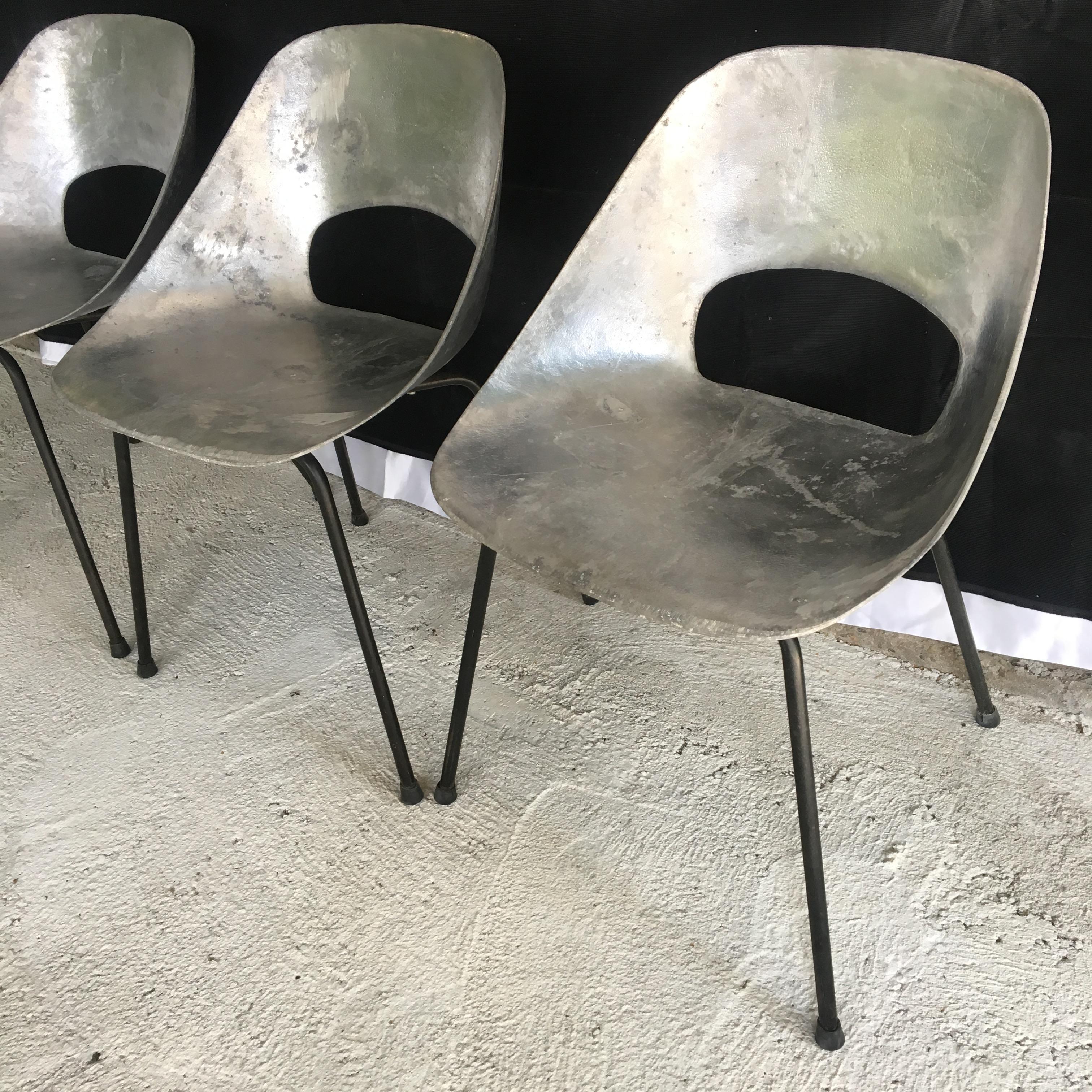 Beautiful and very stylish iconic chairs by the great French designer Pierre Guariche. A very rare and sought-after model today, produced about 70 years ago. The chairs are in perfect condition.