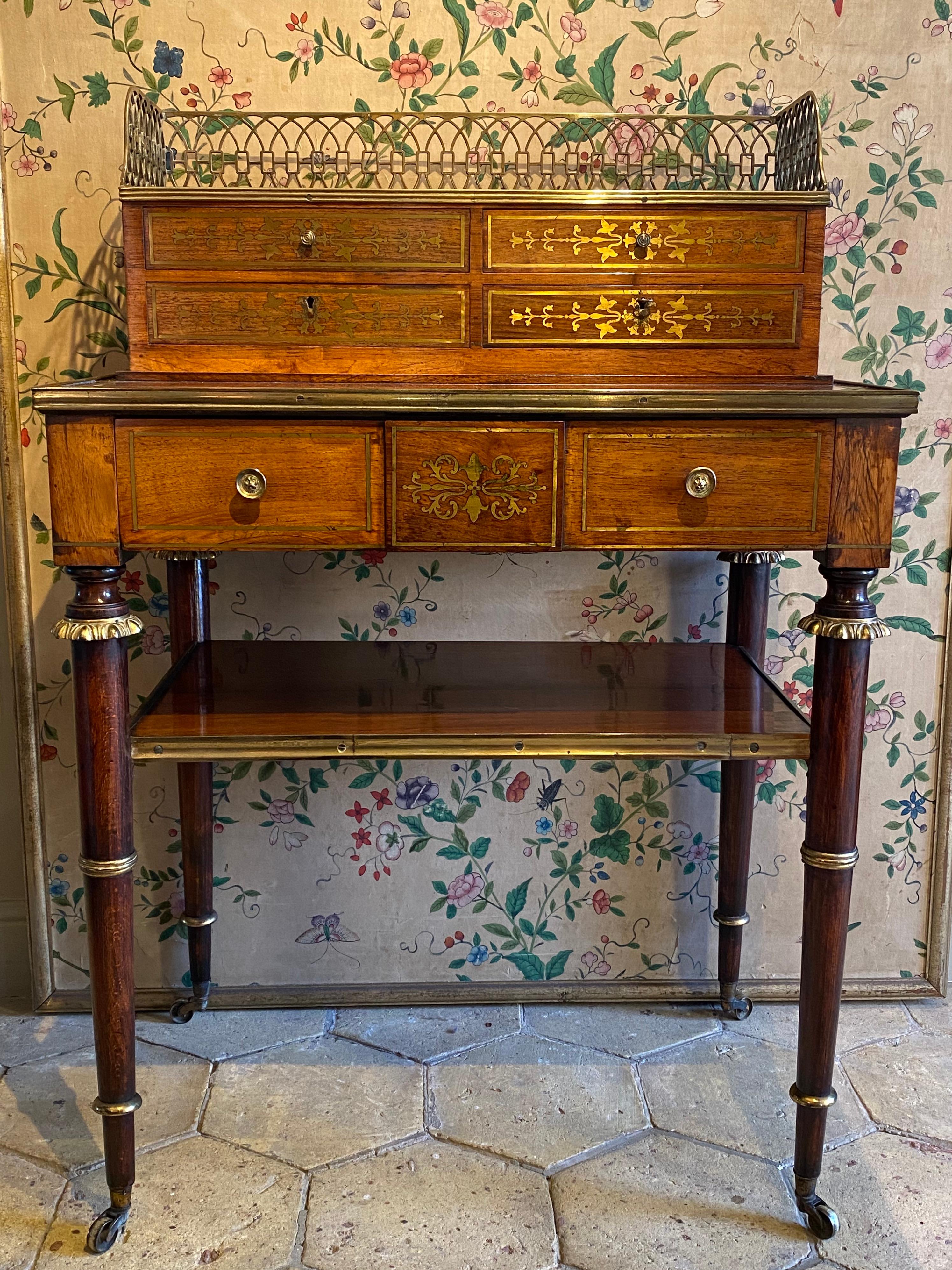 An exceptional English Regency-period bonheur du jour attributed to John Maclean, ca 1810.

A Fine early 19th century rosewood and brass-inlaid bonheur du jour or writing desk, of the highest quality.

Of lovely color and patina. In superb