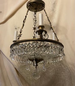 Exceptionnel lustre Empire Regency en bronze doré et cristal taillé de style Régence
