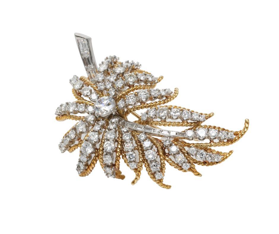 Exceptional Retro Brooch 18k Yellow Gold, Platinum and 5.50ctw Diamonds 

   Brooch 
     Metal - 18k Yellow Gold and Platinum
     Weight - 22.9 Grams 
     Dimensions - 2.00in x 1.50in 

  Stones 
     Diamonds - 
          Center Stone: