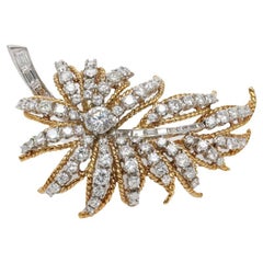 Exceptionnelle broche rétro en or jaune 18 carats, platine et diamants 5,50 carats