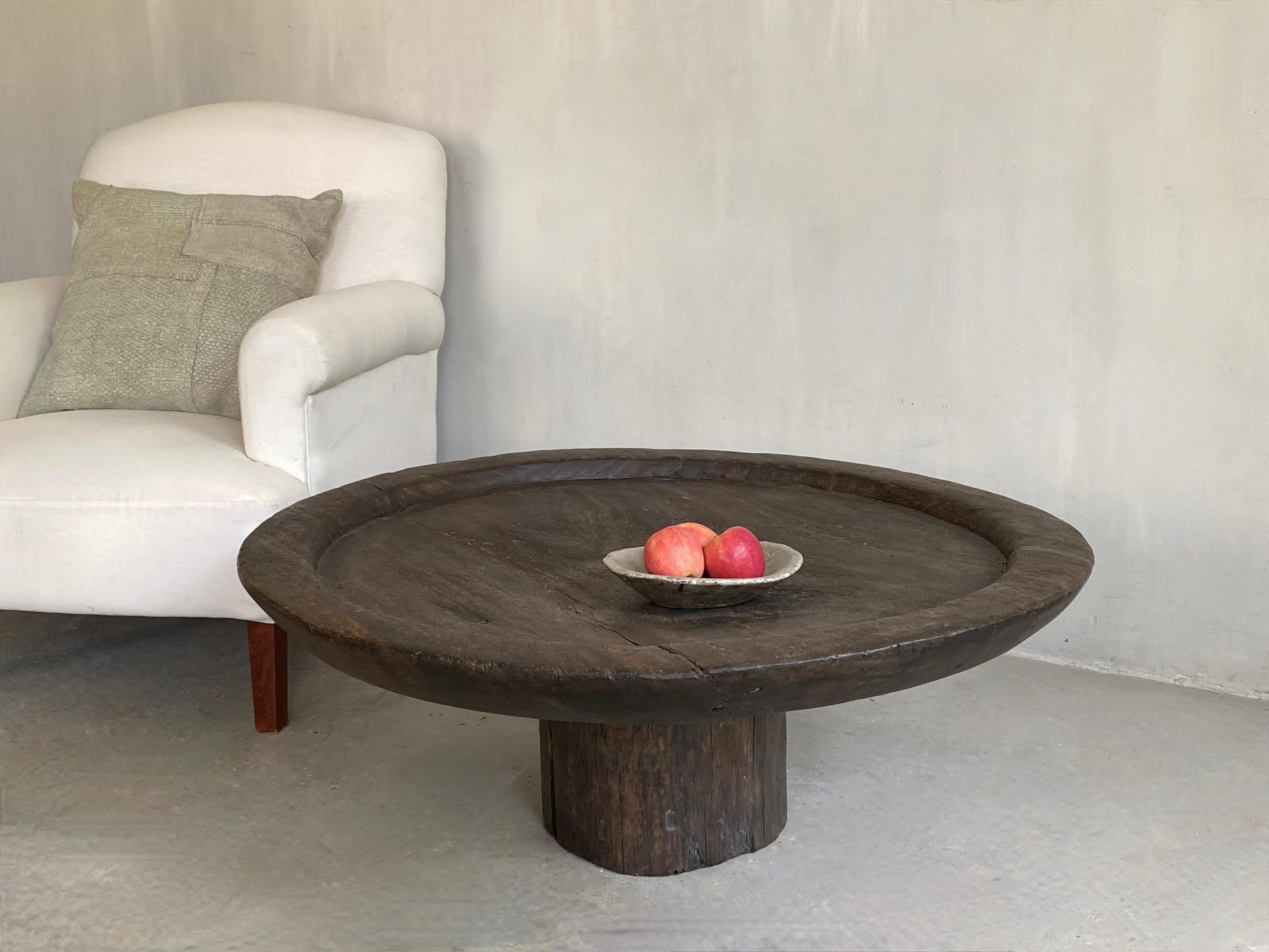 This coffee table is definitely one of a kind, it is a composition of a very old oak tablet, sculpted around 1900 and a base in solid pine wood.

The simplicity and purity of the materials work.
The shades in the Material are respected.


We