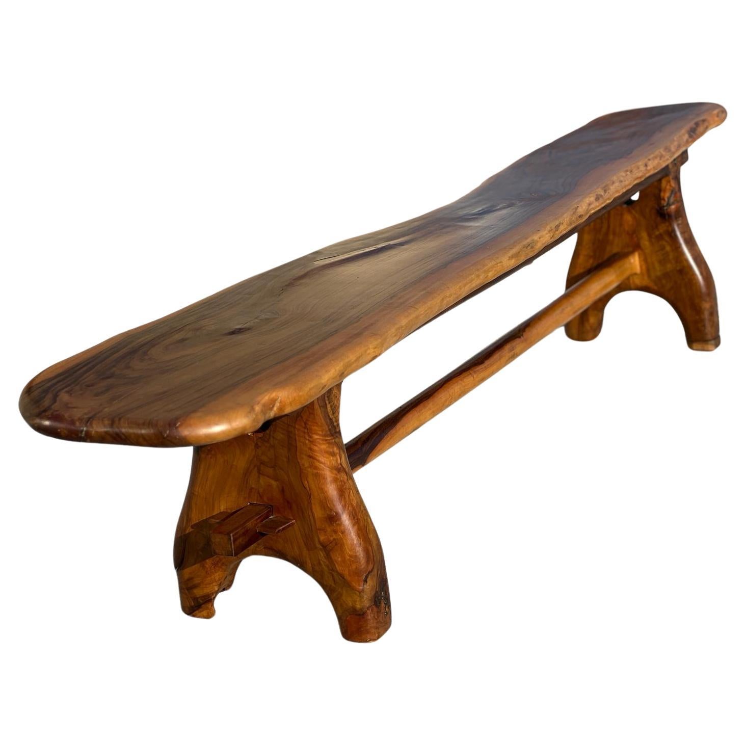 Exceptional, sculptural bench in solid olive wood, French work 1960 For Sale