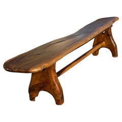 Exceptional, sculptural bench in solid olive wood, French work 1960