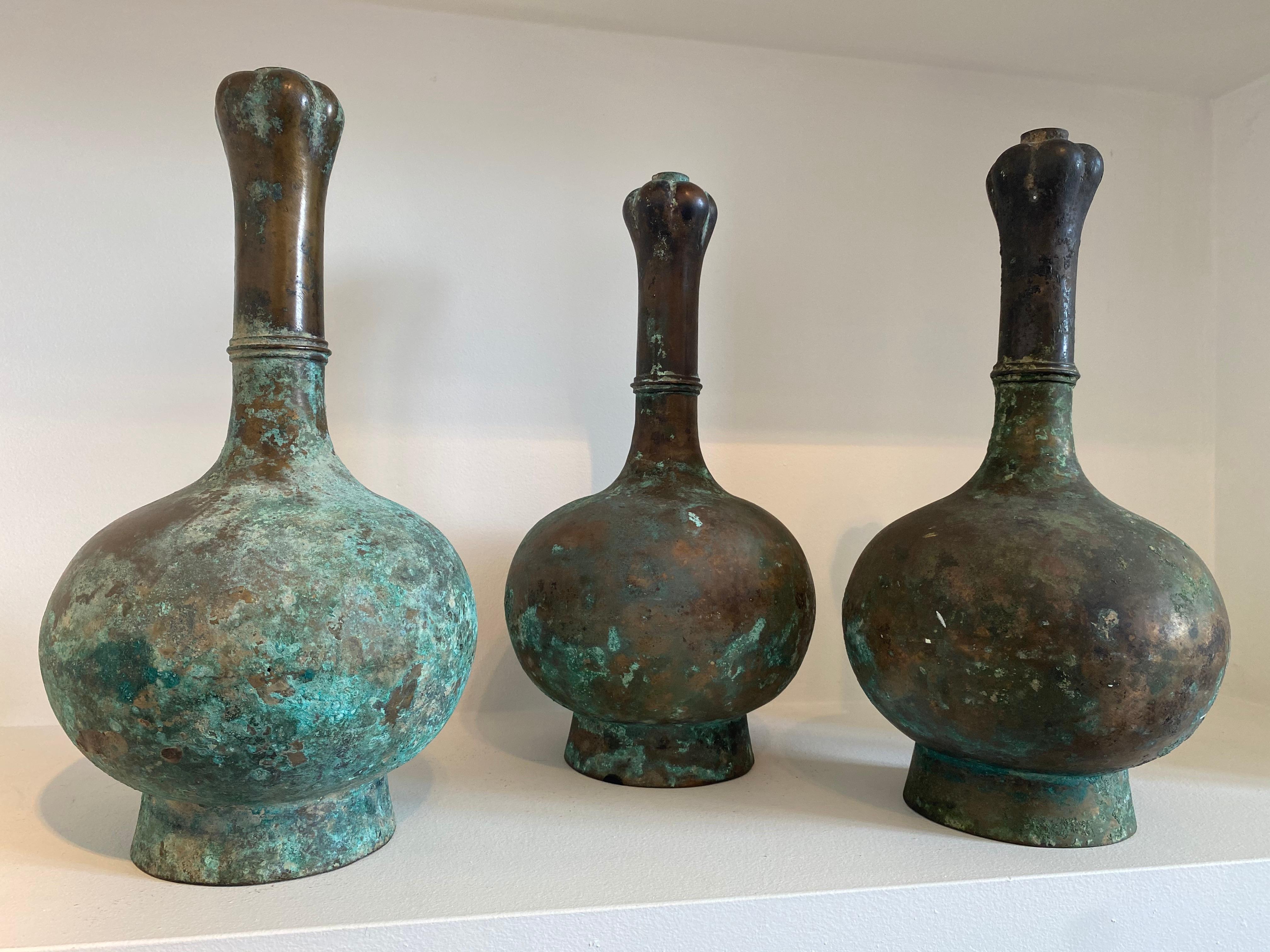 Exceptional, Beautiful set of 3 Chinese Bronze Han Vases,
great patina and warm and worn color,
exceptional to have a collection of 3 of these vases

 