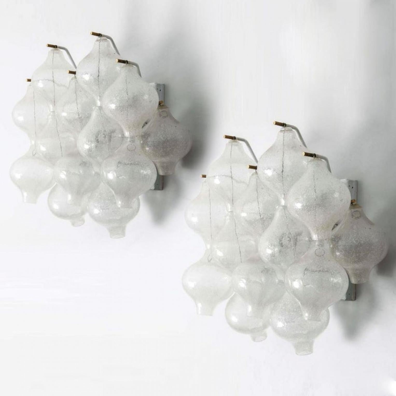 An exceptional 'Tulipan' set by J.T. Kalmar, Austria, Vienna, manufactured in 20th century, circa 1970 (late 1960s-early 1970s). With beautiful Murano Tulipan shaped blown bubble glasses. Several glasses are mounted on a white enameled metal frame.