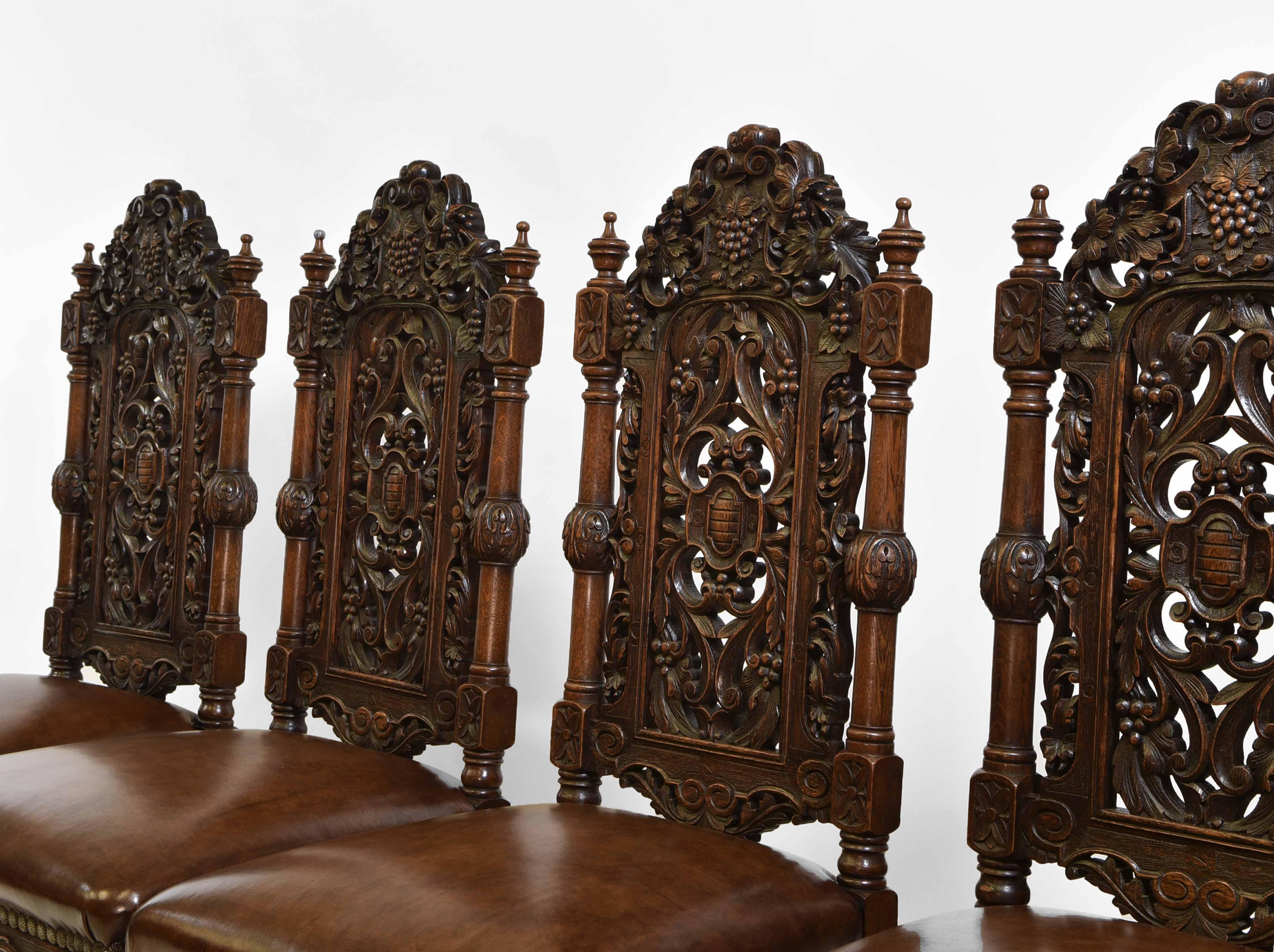 Victorian Exceptional Set Of 8 English Antique Carved Oak Hand Dyed Leather Dining Chairs For Sale