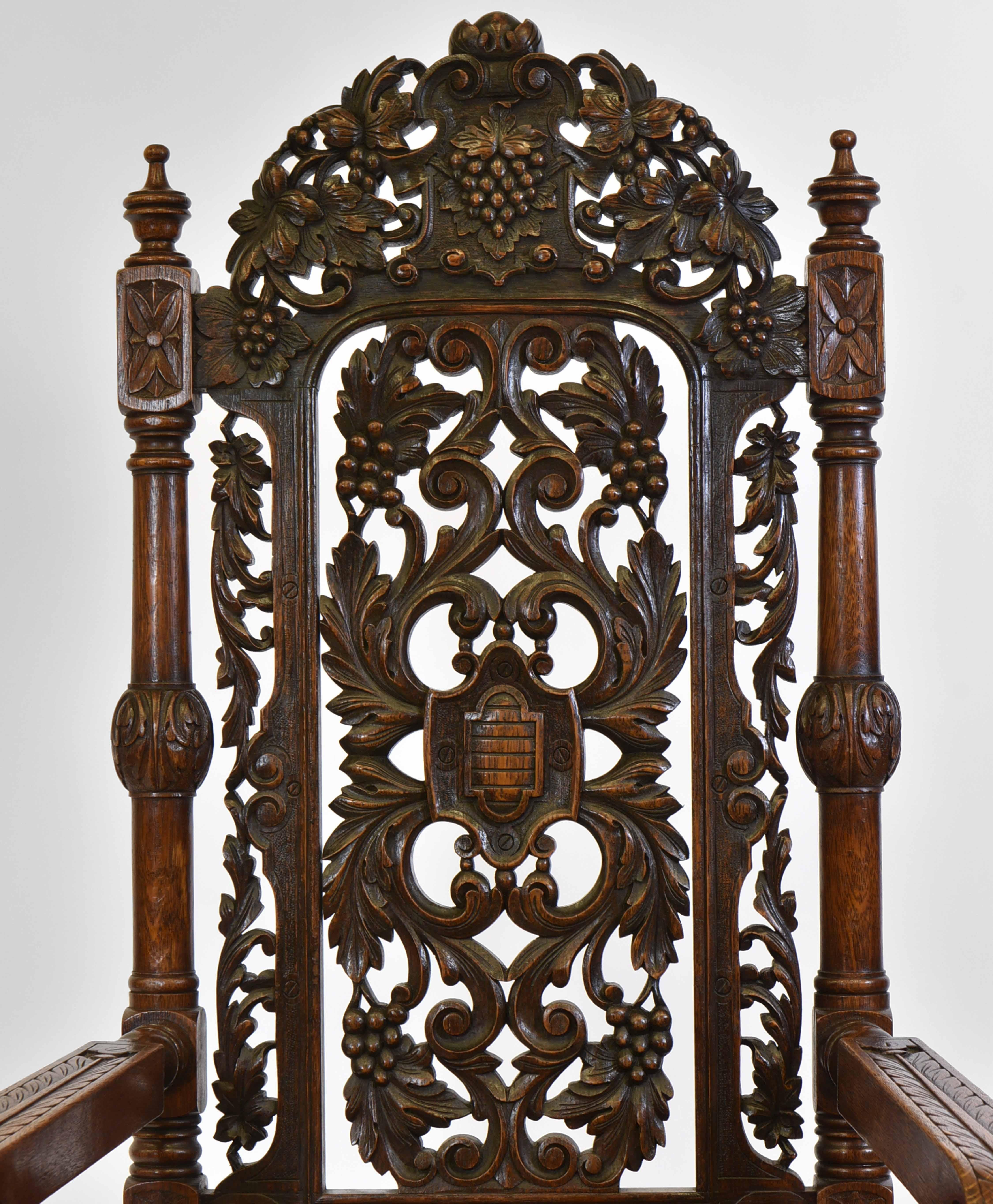 Hand-Carved Exceptional Set Of 8 English Antique Carved Oak Hand Dyed Leather Dining Chairs For Sale