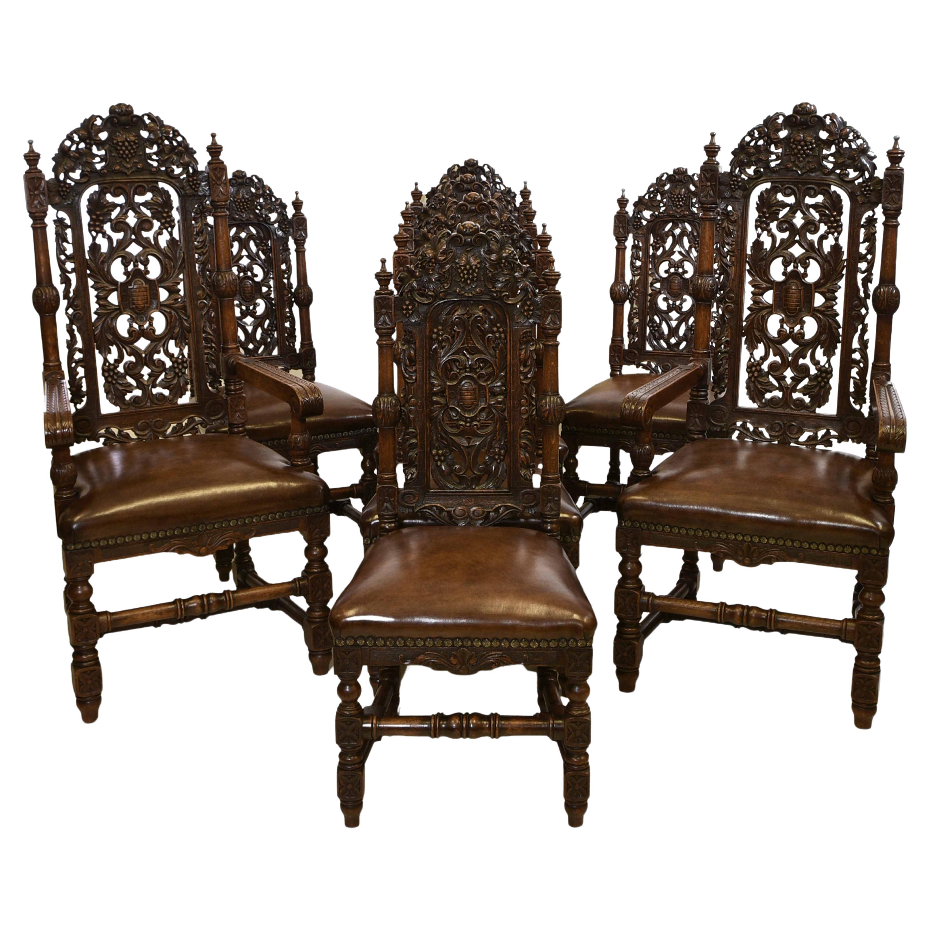 Exceptional Set Of 8 English Antique Carved Oak Hand Dyed Leather Dining Chairs For Sale