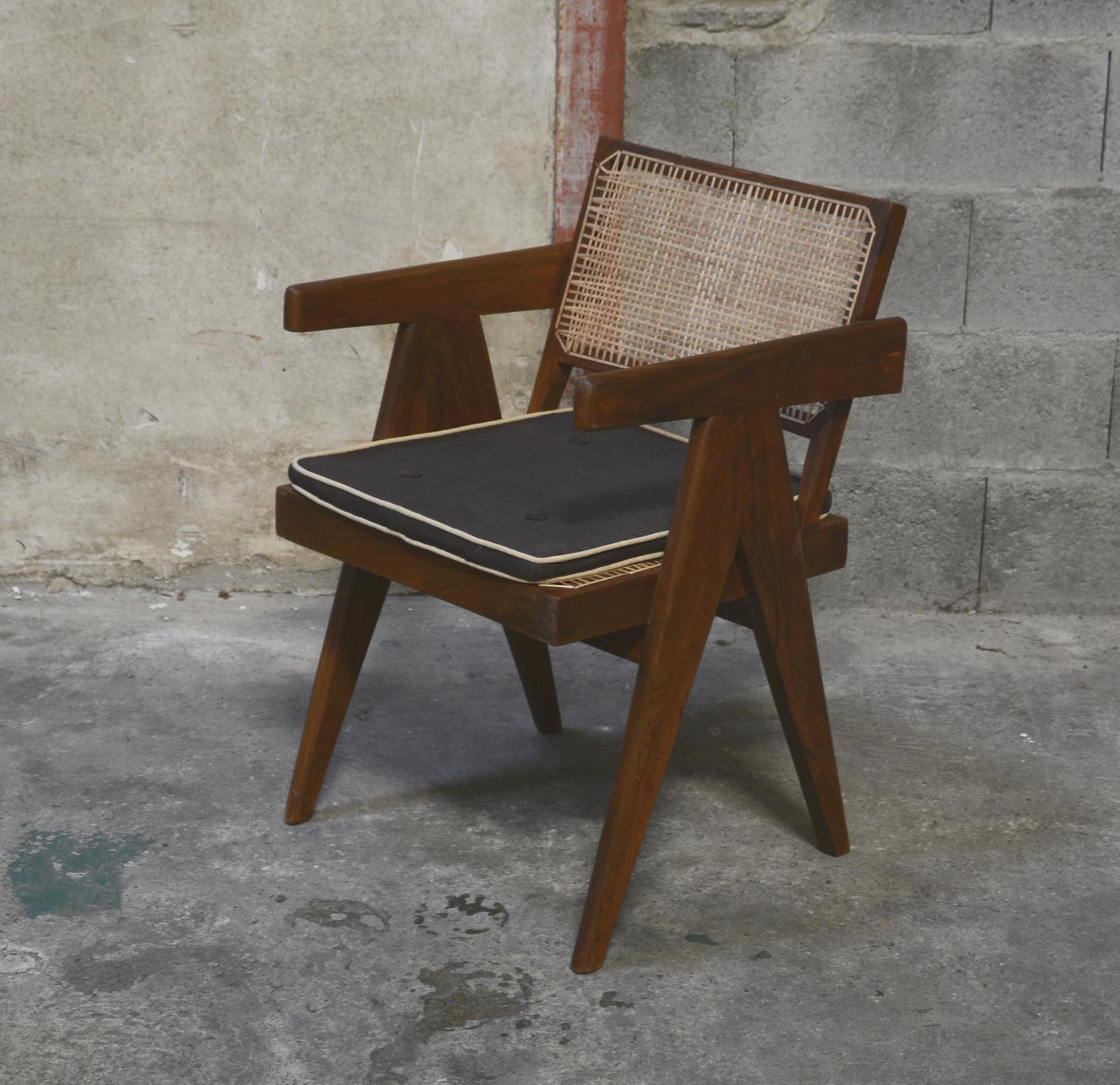 Pierre Jeanneret, rare set of 8 cane and teak wood office Armchairs designed for administrative buildings in Chandigarh, India. Back attached to the seat. Teak, woven cane and upholstered seat cushion featuring cloth covering. 5 chairs have their
