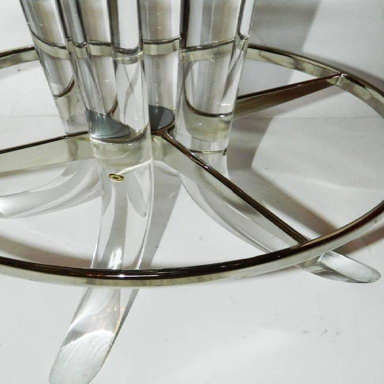 Fantastic and rare set of seven Lucite bar stools by Hill Manufacturers.